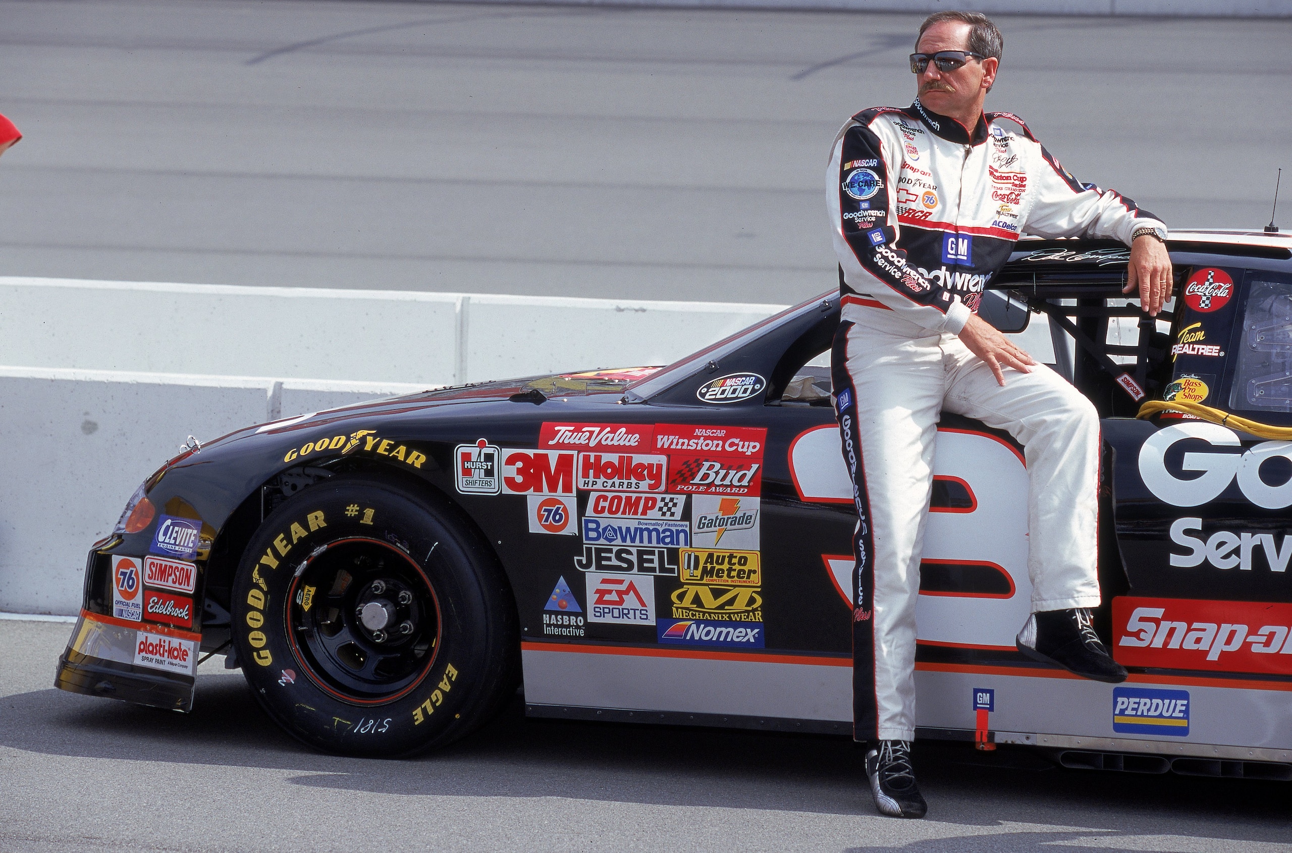 30 Apr 2000: Dale Earnhardt Sr. poses with his car during the NAPA Auto Parts 500, Part of the NASCAR Winston Cup Series, at the California Speedway in Fontana, California. Mandatory Credit: Jon Ferrey /Allsport 30 Apr 2000: Dale Earnhardt Sr. poses with his car during the NAPA Auto Parts 500, Part of the NASCAR Winston Cup Series, at the California Speedway in Fontana, California. Mandatory Credit: Jon Ferrey /Allsport