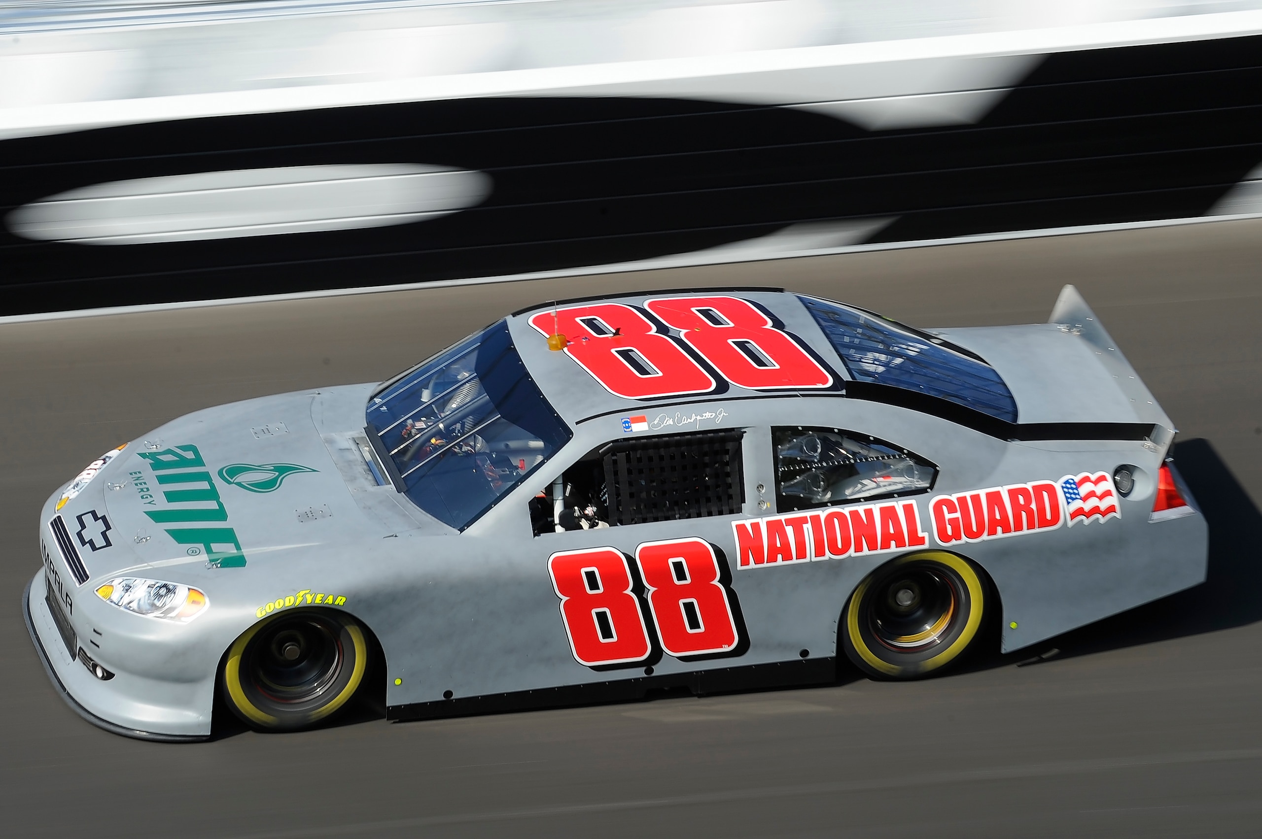 DAYTONA BEACH, FL - JANUARY 20: Dale Earnhardt Jr., driver of the #88 AMP Energy/National Guard Chevrolet, exits turn four during testing at Daytona International Speedway on January 20, 2011 in Daytona Beach, Florida. (Photo by Jared C. Tilton/Getty Im DAYTONA BEACH, FL - JANUARY 20: Dale Earnhardt Jr., driver of the #88 AMP Energy/National Guard Chevrolet, exits turn four during testing at Daytona International Speedway on January 20, 2011 in Daytona Beach, Florida. (Photo by Jared C. Tilton/Getty Im