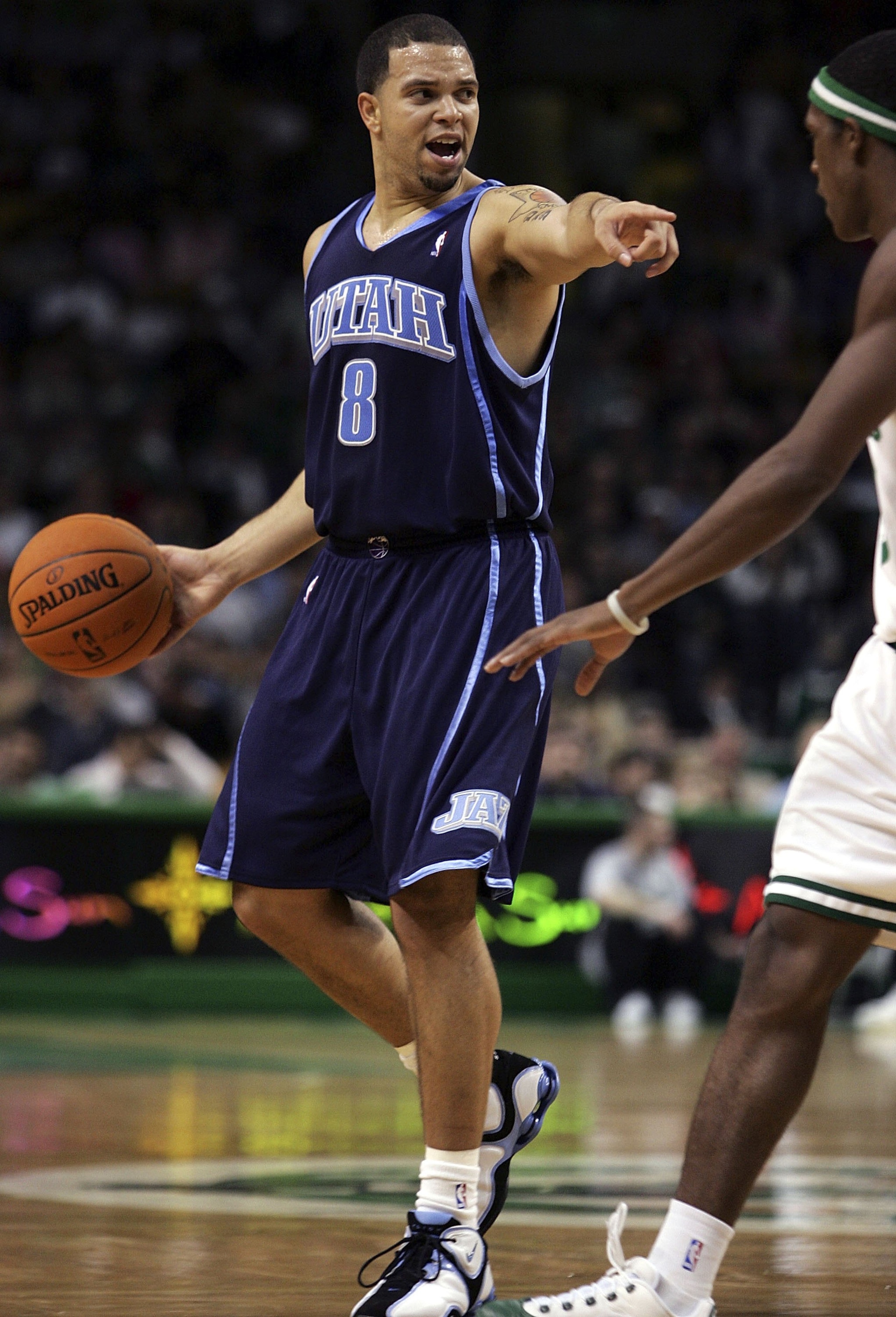BOSTON - NOVEMBER 10:  Deron Williams #8 of the Utah Jazz calls out the play as Rajon Rondo #9 of the Boston Celtics defends on November 10, 2006 at the TD Banknorth Garden in Boston, Massachusetts. The Jazz defeated the Celtics 107-100.  NOTE TO USER: Us