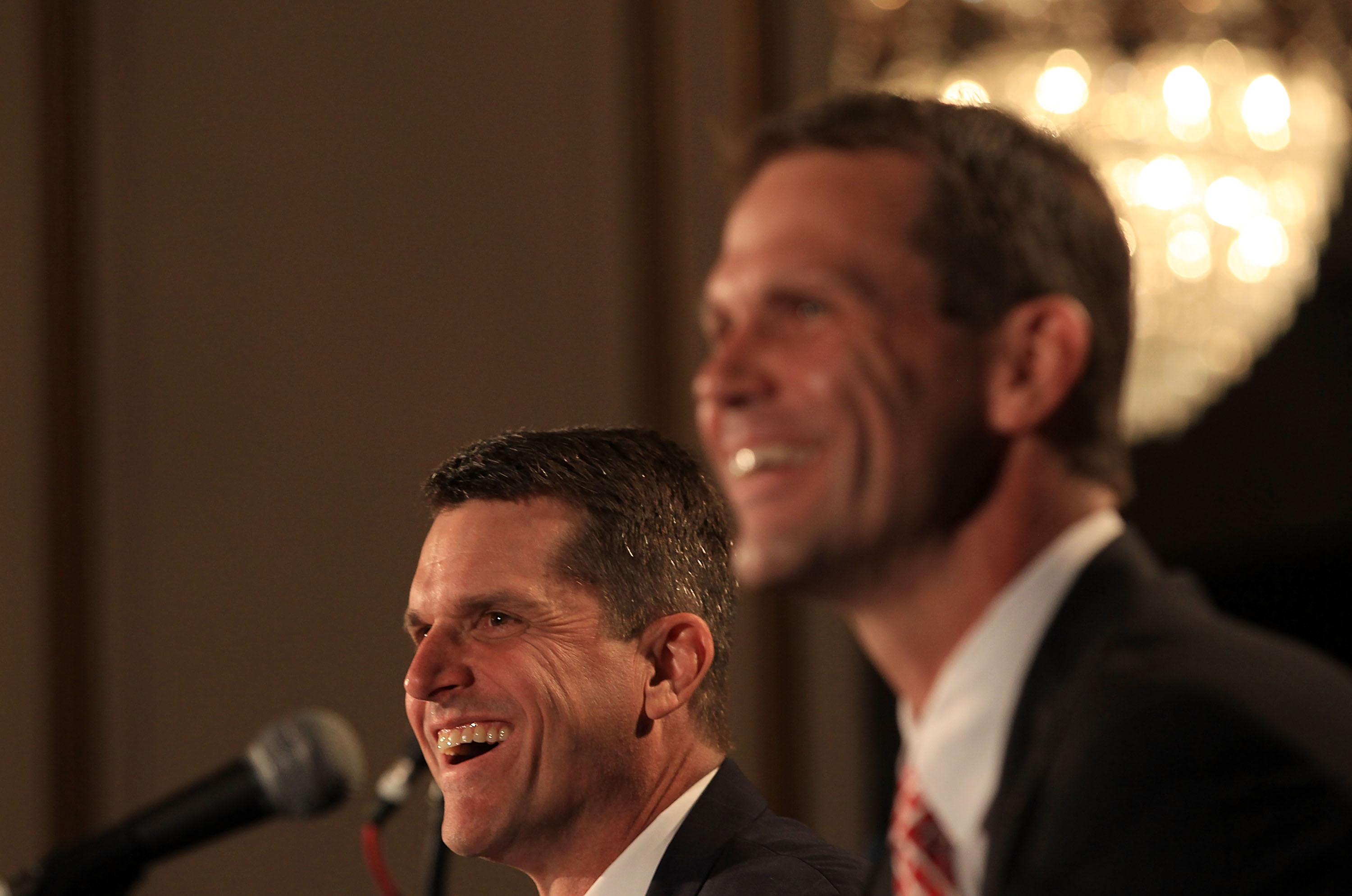 SAN FRANCISCO, CA - JANUARY 07:  Jim Harbaugh and general manager Trent Baalke speak at a press conference where Harbaugh was introduced as the new San Francisco 49ers head coach at the Palace Hotel on January 7, 2011 in San Francisco, California.  (Photo