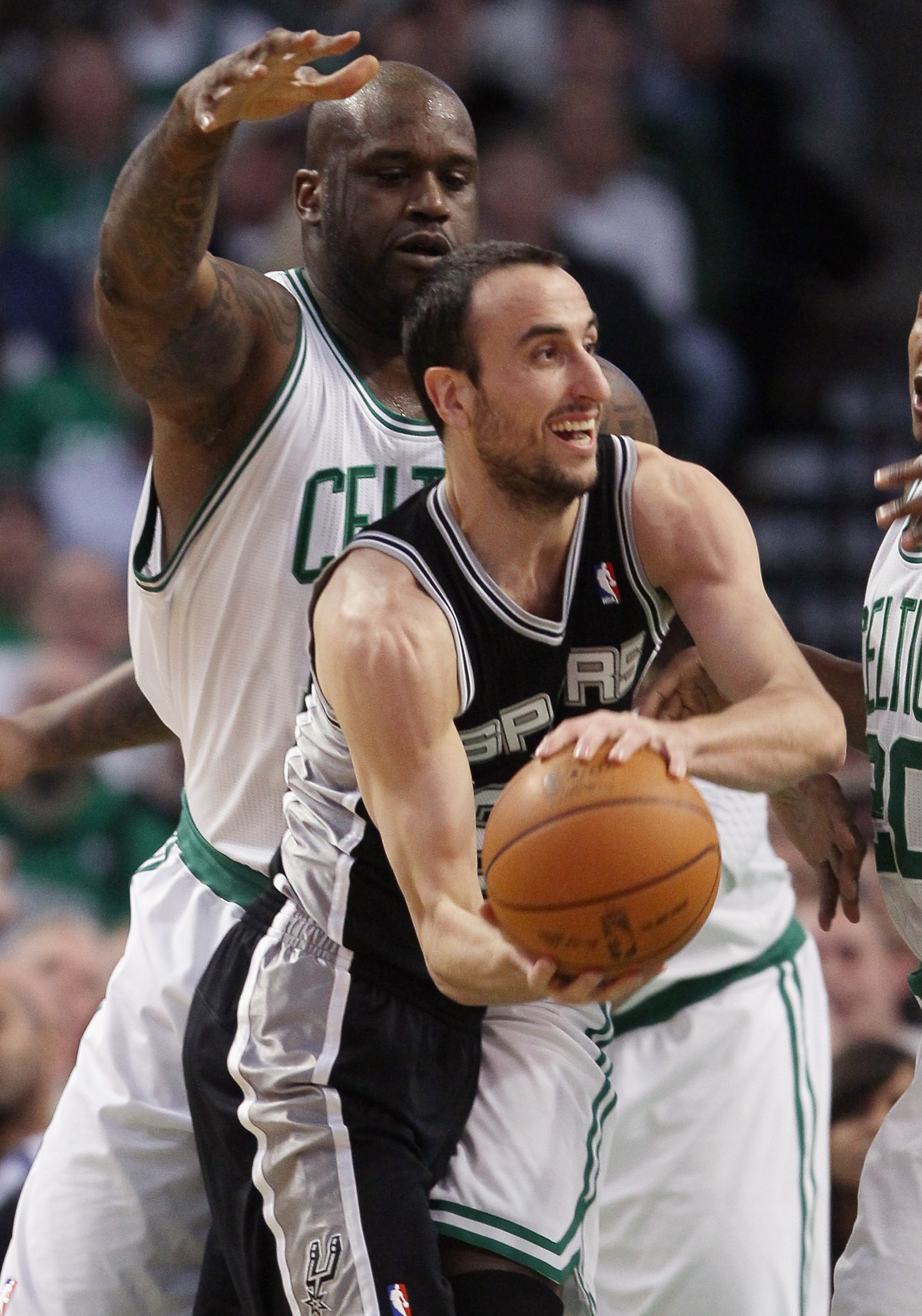 BOSTON, MA - JANUARY 05:  Manu Ginobili #20 of the San Antonio Spurs tries to pass as Shaquille O'Neal #36 of the Boston Celtics defends on January 5, 2011 at the TD Garden in Boston, Massachusetts. NOTE TO USER: User expressly acknowledges and agrees tha