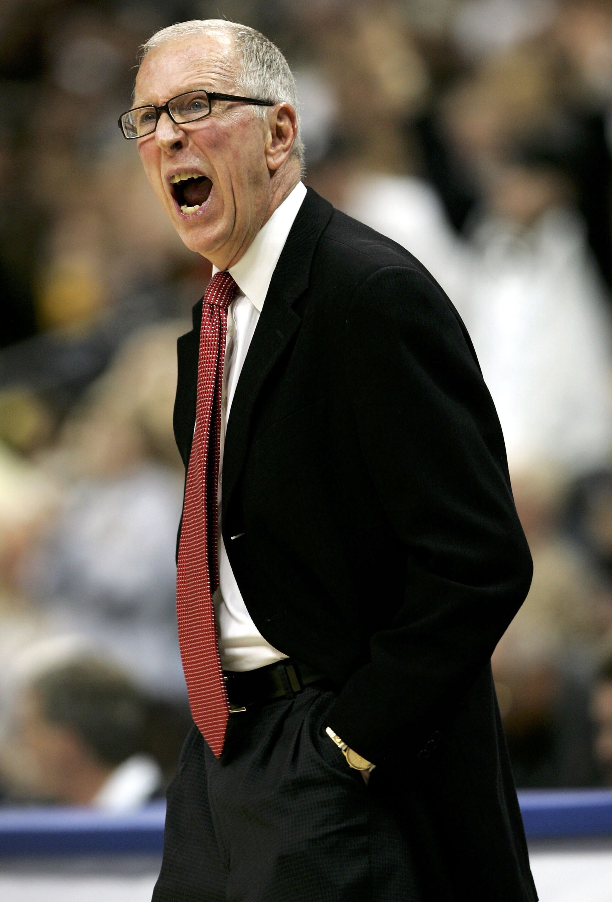 DENVER - MARCH 11:  Head coach Steve Fisher of the San Diego State University Aztecs coaches his team against the Wyoming Cowboys in the championship of the Mountain West Conference Basketball Tournament on March 11, 2006 at the Pepsi Center in Denver, Co