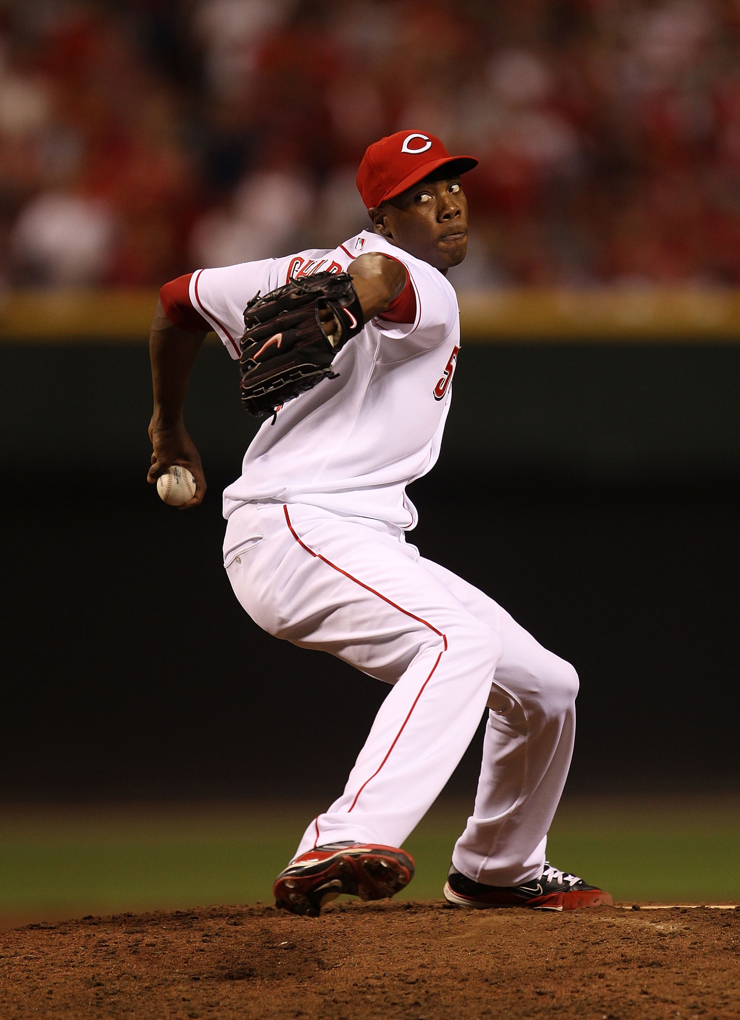 CINCINNATI - OCTOBER 10: Aroldis Chapman #54 of the Cincinnati Reds pitches in the 9th inning against the Philadelphia Phillies during game 3 of the NLDS at Great American Ball Park on October 10, 2010 in Cincinnati, Ohio. The Phillies defeated the Reds 2