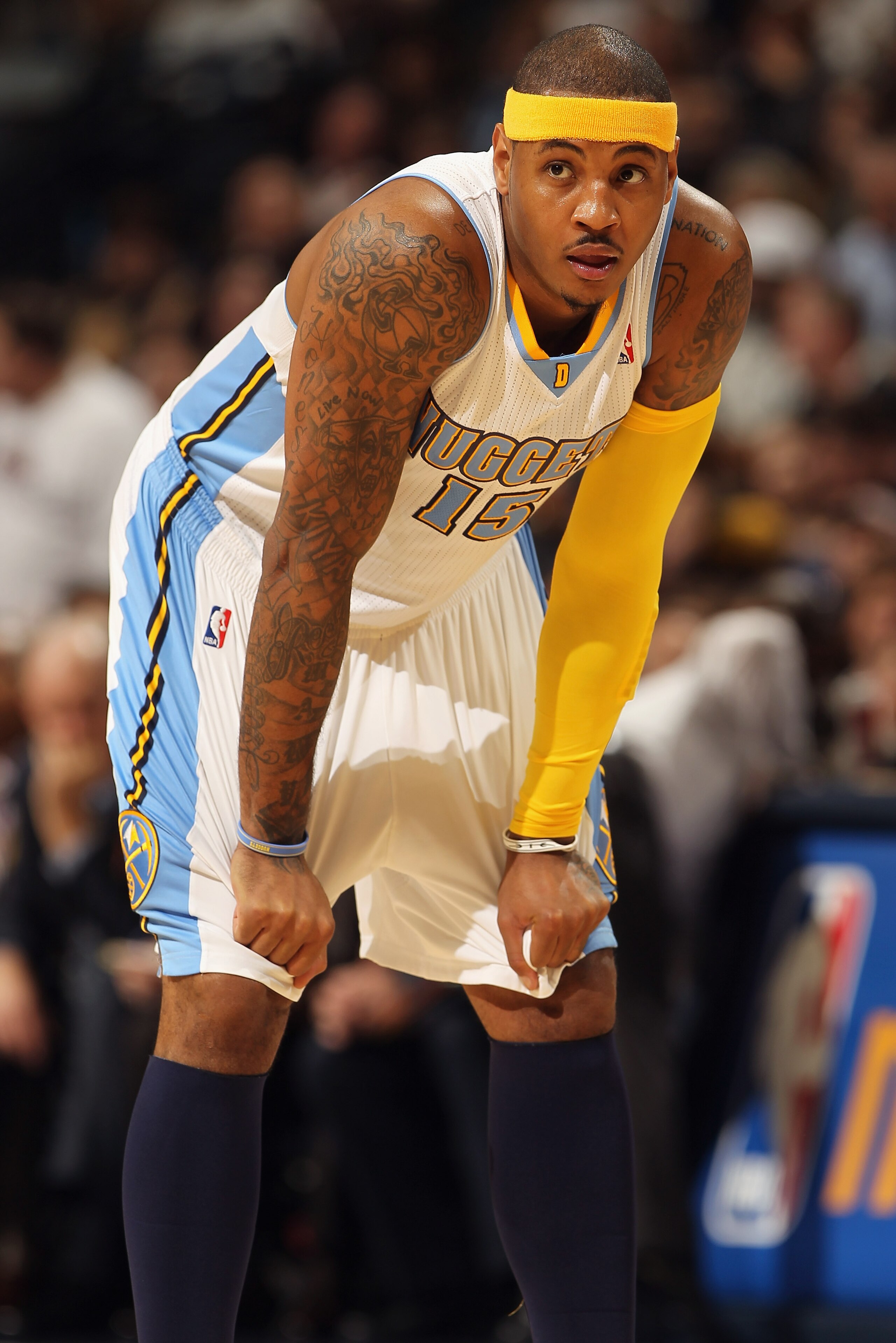 DENVER, CO - JANUARY 13: Carmelo Anthony #15 of the Denver Nuggets looks on during a break in the action against the Miami Heat at the Pepsi Center on January 13, 2011 in Denver, Colorado. The Nuggets defeated the Heat 130-102. NOTE TO USER: User express DENVER, CO - JANUARY 13: Carmelo Anthony #15 of the Denver Nuggets looks on during a break in the action against the Miami Heat at the Pepsi Center on January 13, 2011 in Denver, Colorado. The Nuggets defeated the Heat 130-102. NOTE TO USER: User express