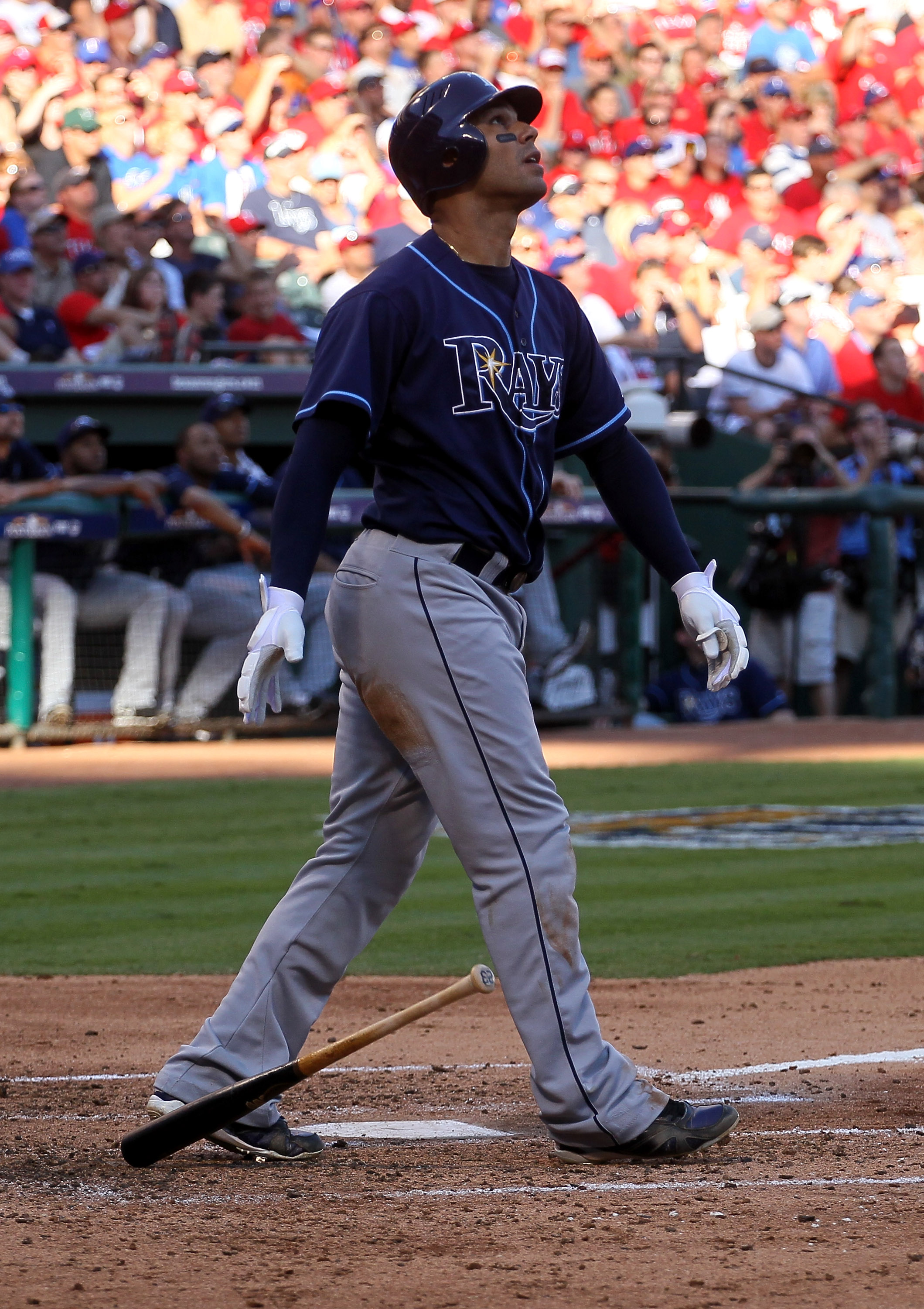 ARLINGTON, TX - OCTOBER 9:  Carlos Pena #23 of the Tampa Bay Rays hits a deep fly out to right field to end the Ray's fourth inning with two runners on base against the Texas Rangers during game three of the ALDS at Rangers Ballpark in Arlington on Octobe