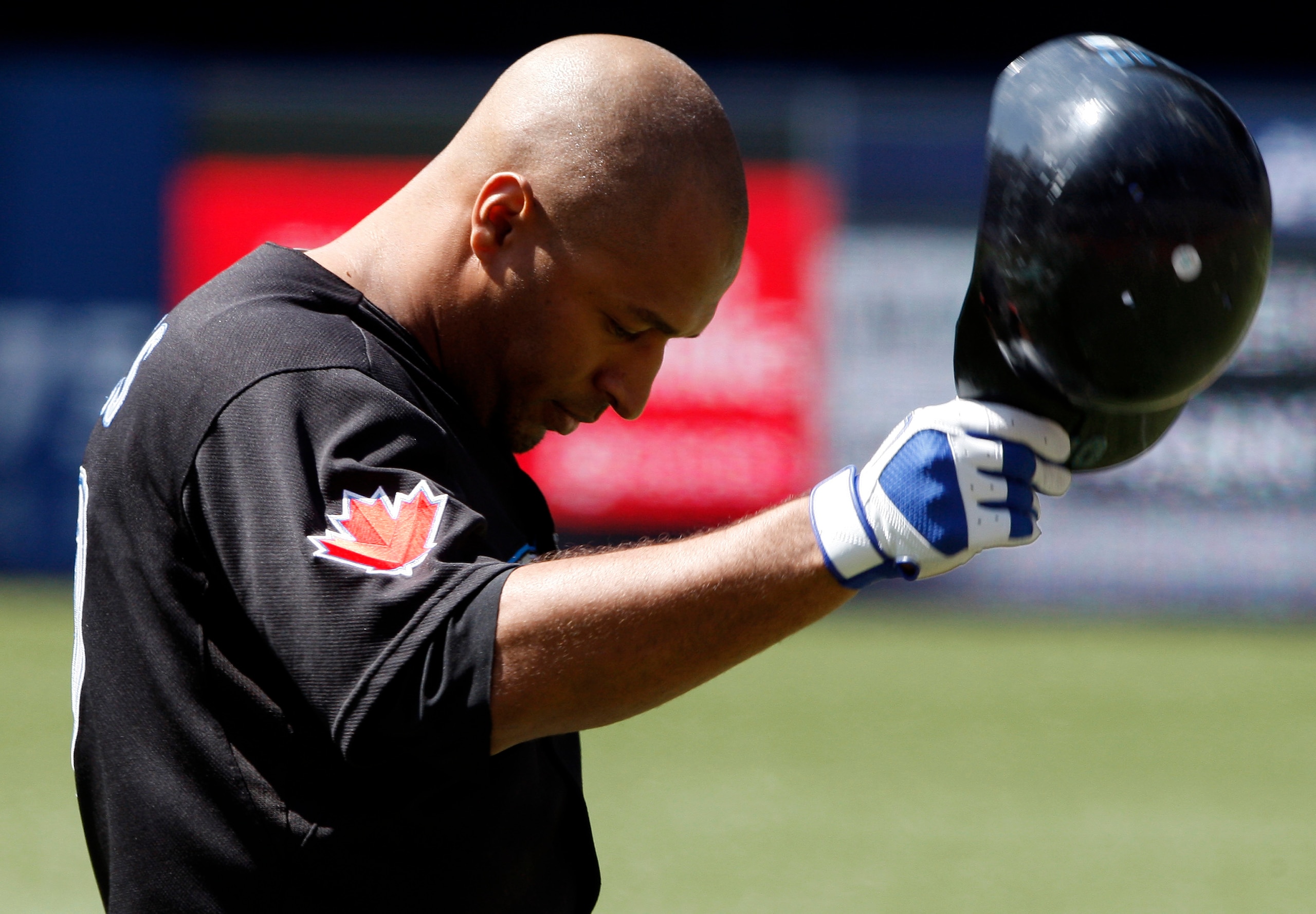 TORONTO - MAY 16: Vernon Wells #10 of the Toronto Blue Jays takes his helmet off after popping out against the Texas Rangers during a MLB game at the Rogers Centre May 16, 2010 in Toronto, Ontario, Canada. (Photo by Abelimages/Getty Images)