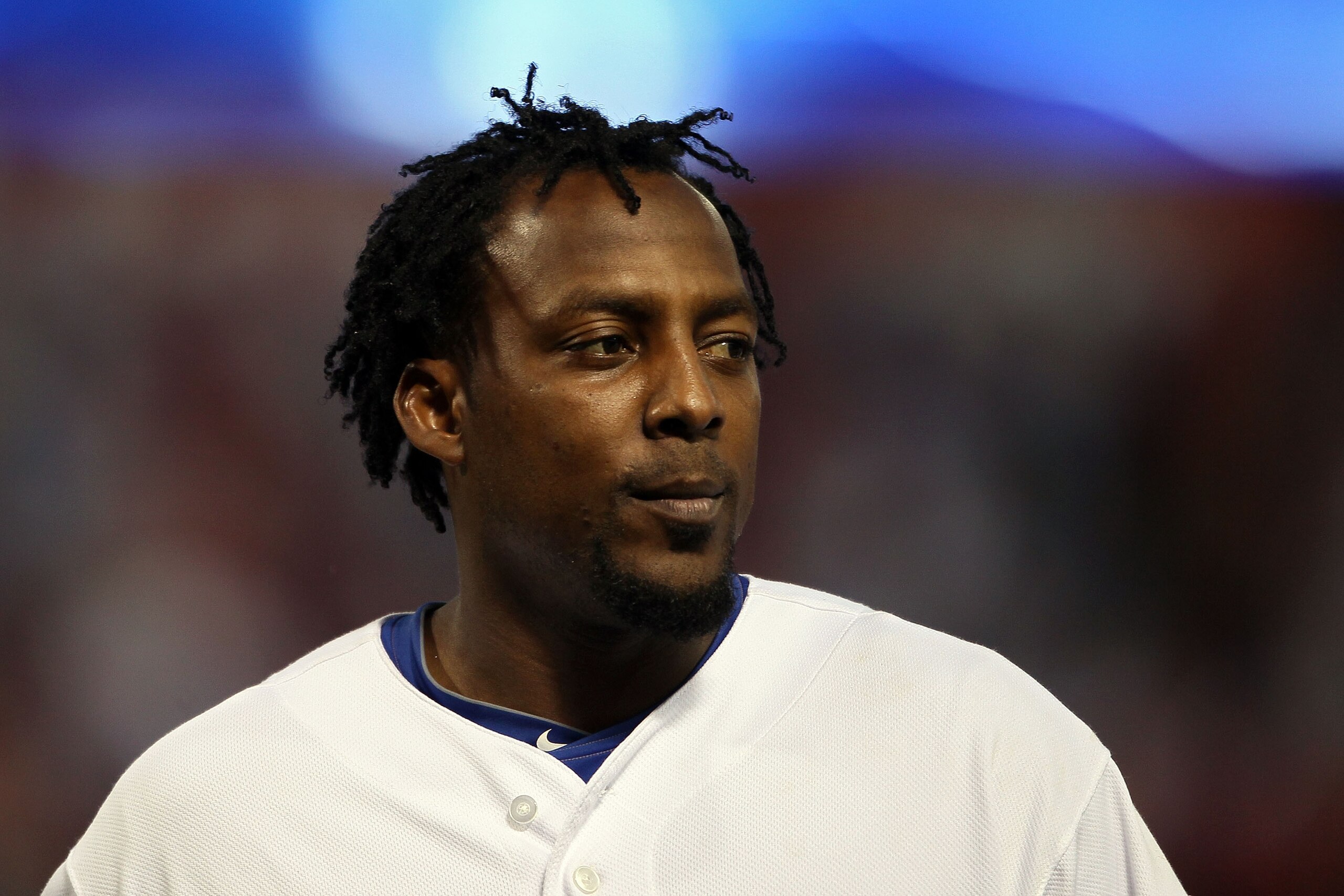ARLINGTON, TX - OCTOBER 16:  Vladimir Guerrero #27 of the Texas Rangers looks on against the New York Yankees in Game Two of the ALCS during the 2010 MLB Playoffs at Rangers Ballpark in Arlington on October 16, 2010 in Arlington, Texas.  (Photo by Elsa/Ge