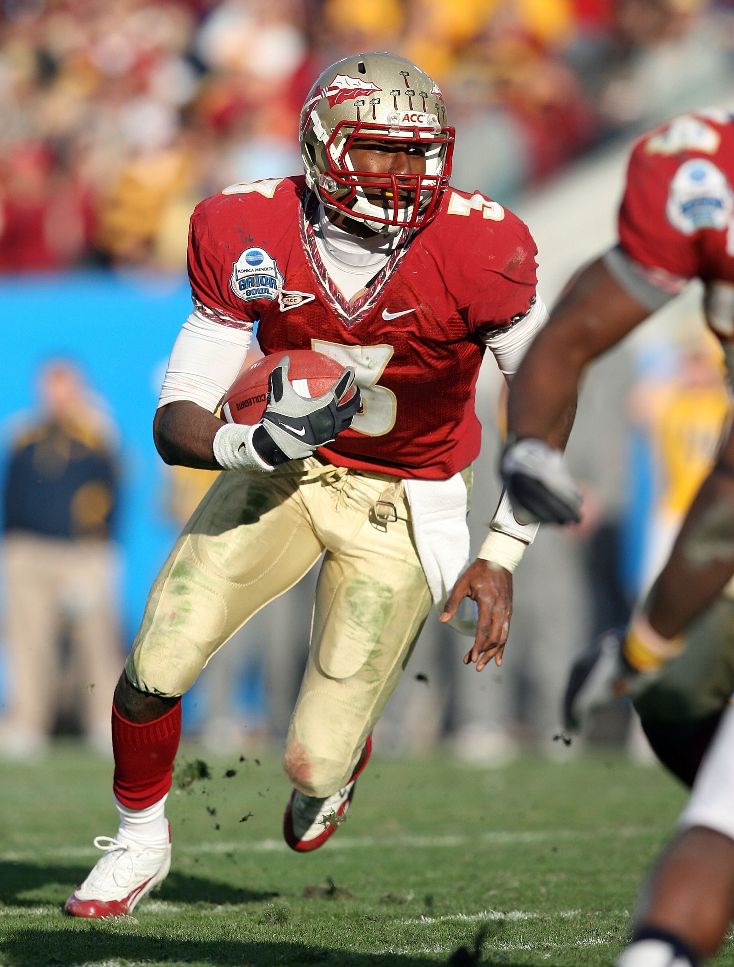 JACKSONVILLE, FL - JANUARY 01:  Quarterback E.J. Manuel #3 of the Florida State Seminoles scrambles against the West Virginia Mountaineers during the Konica Minolta Gator Bowl on January 1, 2010 at Jacksonville Municipal Stadium in Jacksonville, Florida.