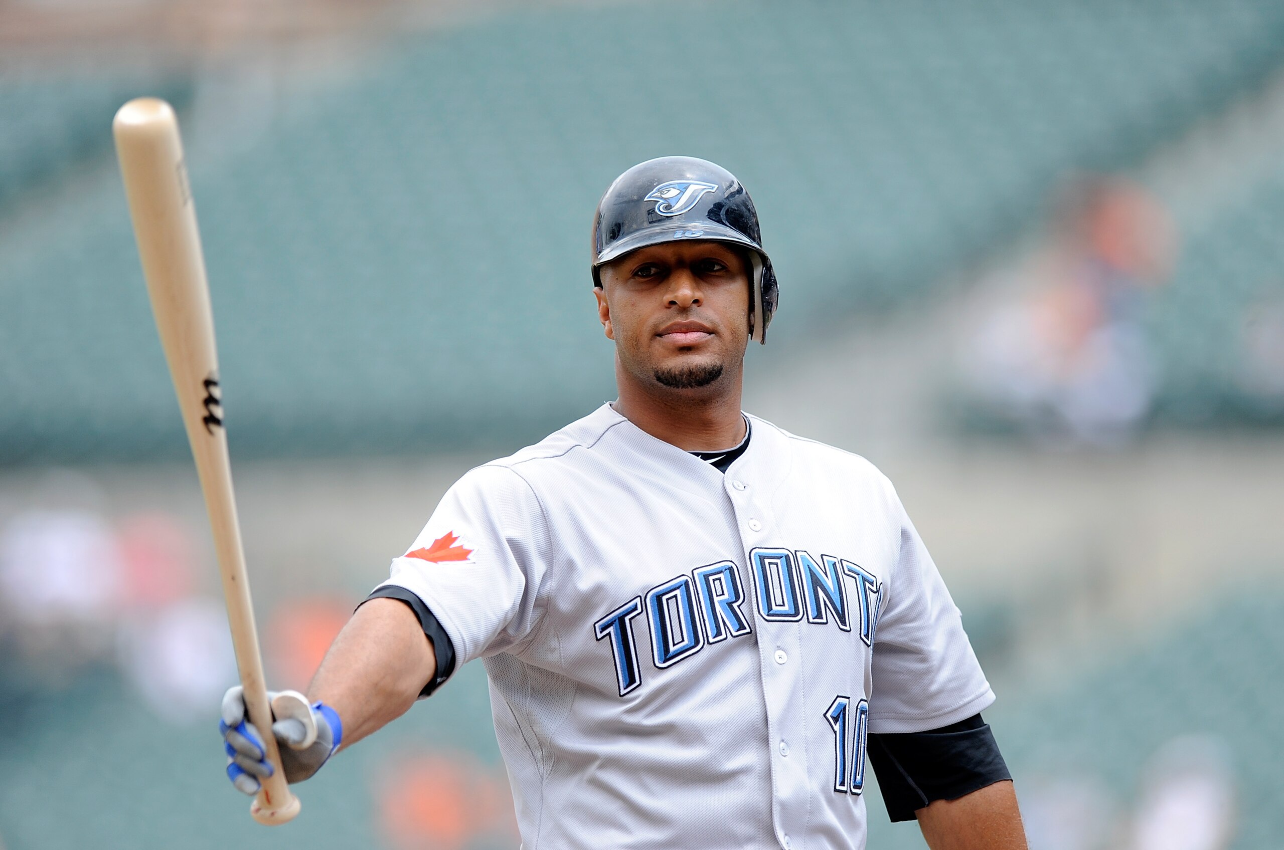 BALTIMORE - JULY 18:  Vernon Wells #10 of the Toronto Blue Jays tosses his bat after striking out against the Baltimore Orioles at Camden Yards on July 18, 2010 in Baltimore, Maryland.  (Photo by Greg Fiume/Getty Images)
