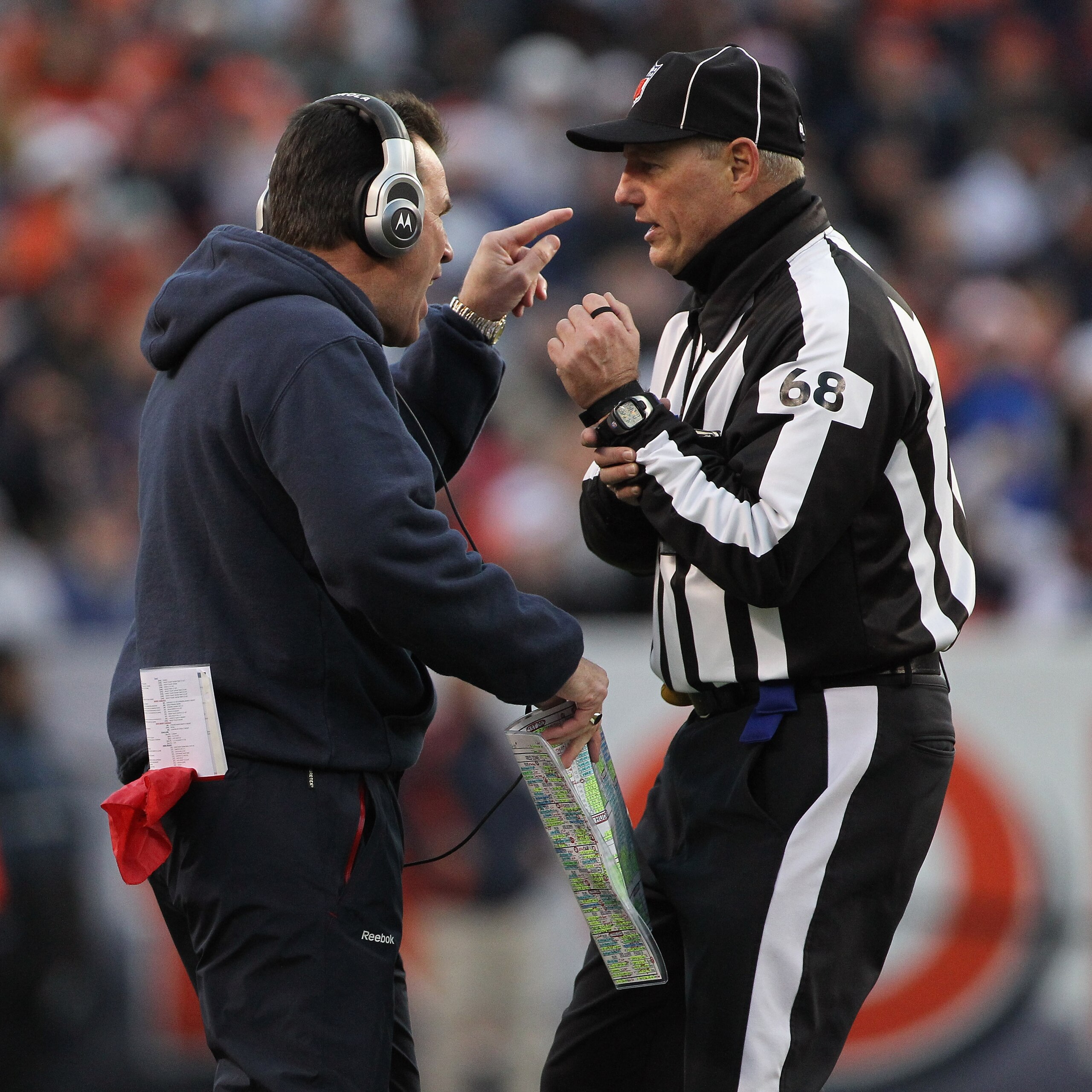 DENVER - DECEMBER 26:  Head coach Gary Kubiak of the Houston Texas has words with line judge Tom Stephan #68 as the Texans' face the Denver Broncos at INVESCO Field at Mile High on December 26, 2010 in Denver, Colorado. The Broncos defeated the Texans 24-