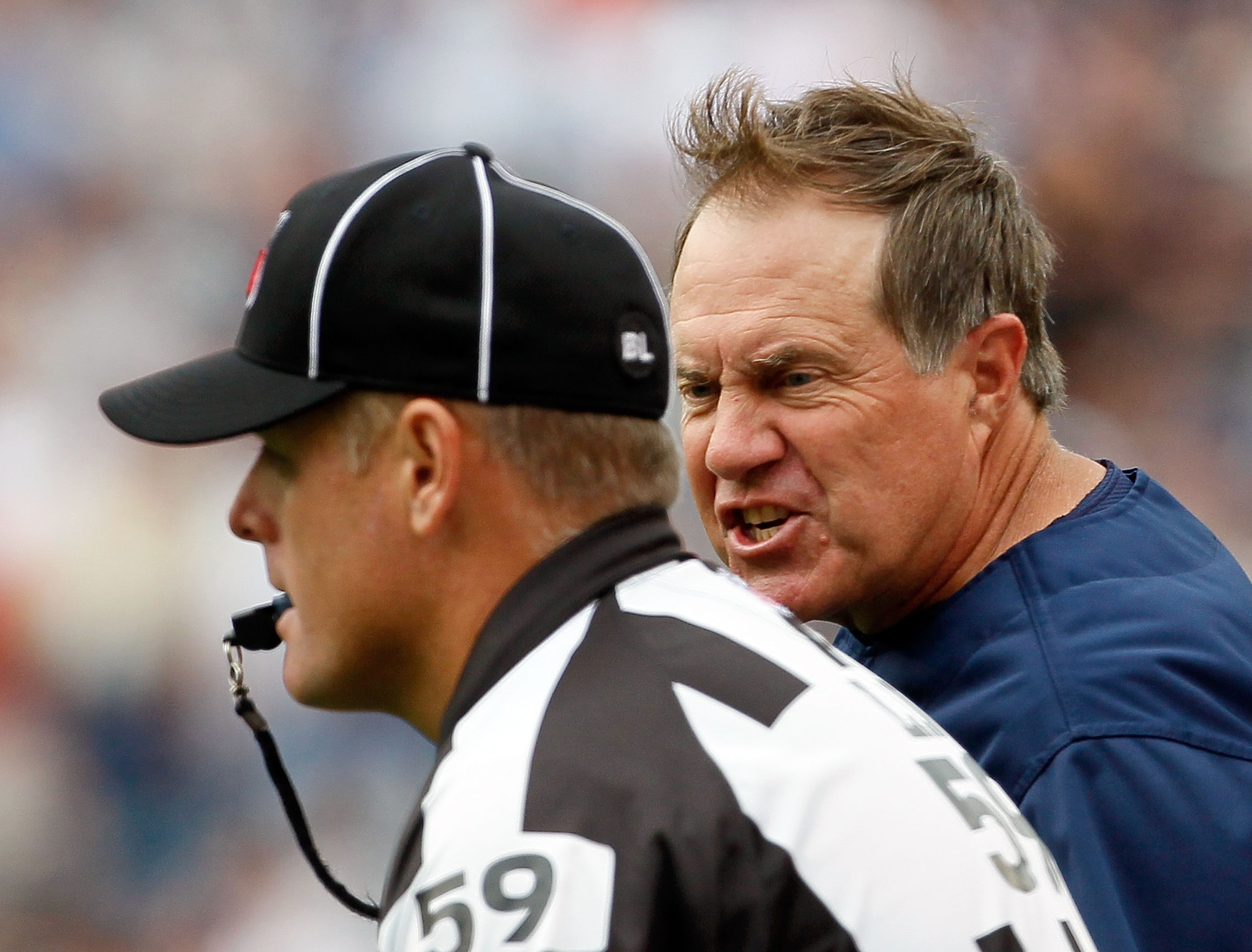 FOXBORO, MA - SEPTEMBER 26:  Coach Bill Belichick of the New England Patriots reacts to an official's call in the first half against the Buffalo Bills at Gillette Stadium on September 26, 2010 in Foxboro, Massachusetts. (Photo by Jim Rogash/Getty Images)