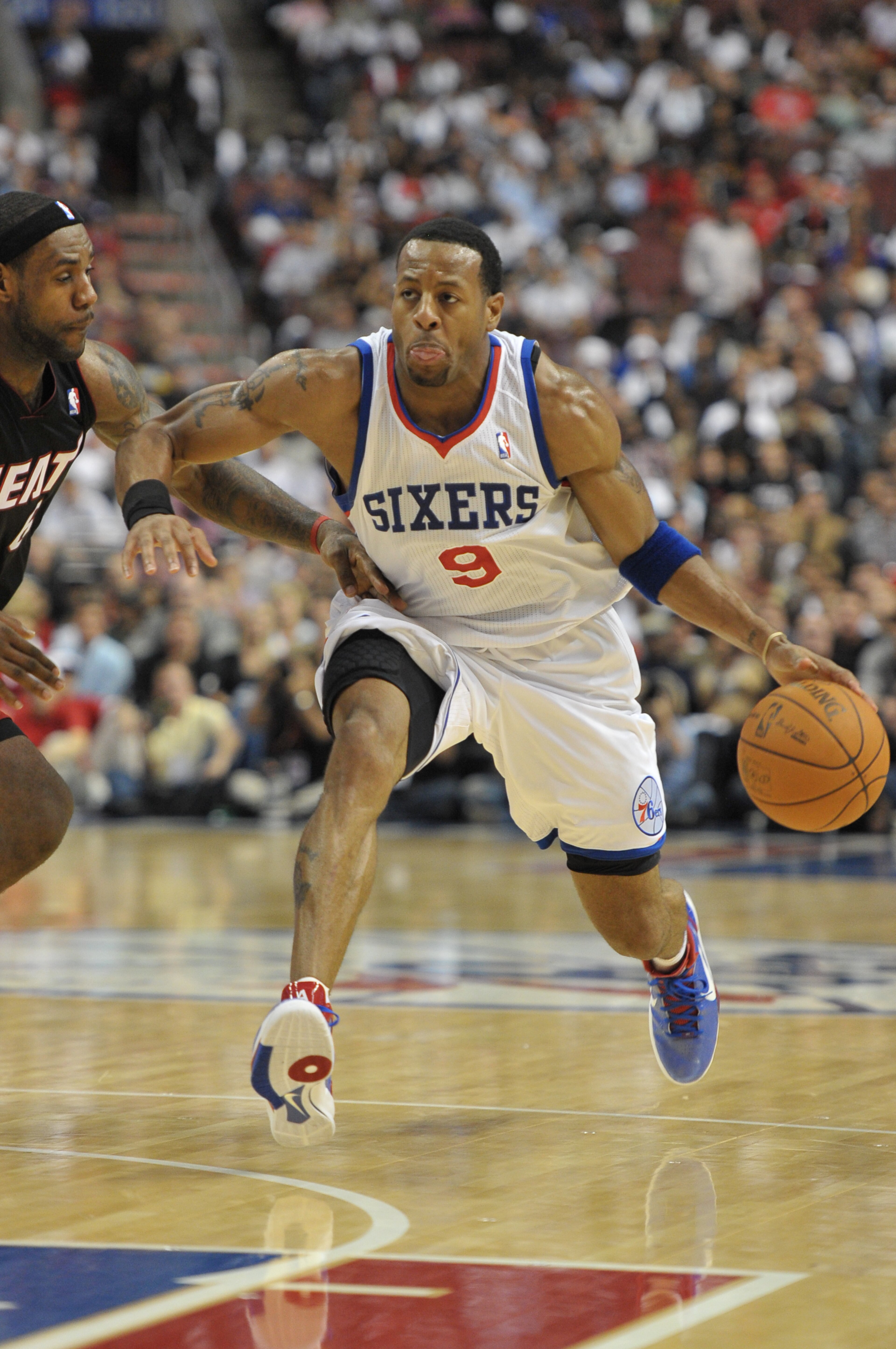 PHILADELPHIA - OCTOBER 27: Andre Iguodala #9 of the Philadelphia 76ers in action during the game against the Miami Heat at the Wells Fargo Center on October 27, 2010 in Philadelphia, Pennsylvania. NOTE TO USER: User expressly acknowledges and agrees that, PHILADELPHIA - OCTOBER 27: Andre Iguodala #9 of the Philadelphia 76ers in action during the game against the Miami Heat at the Wells Fargo Center on October 27, 2010 in Philadelphia, Pennsylvania. NOTE TO USER: User expressly acknowledges and agrees that,