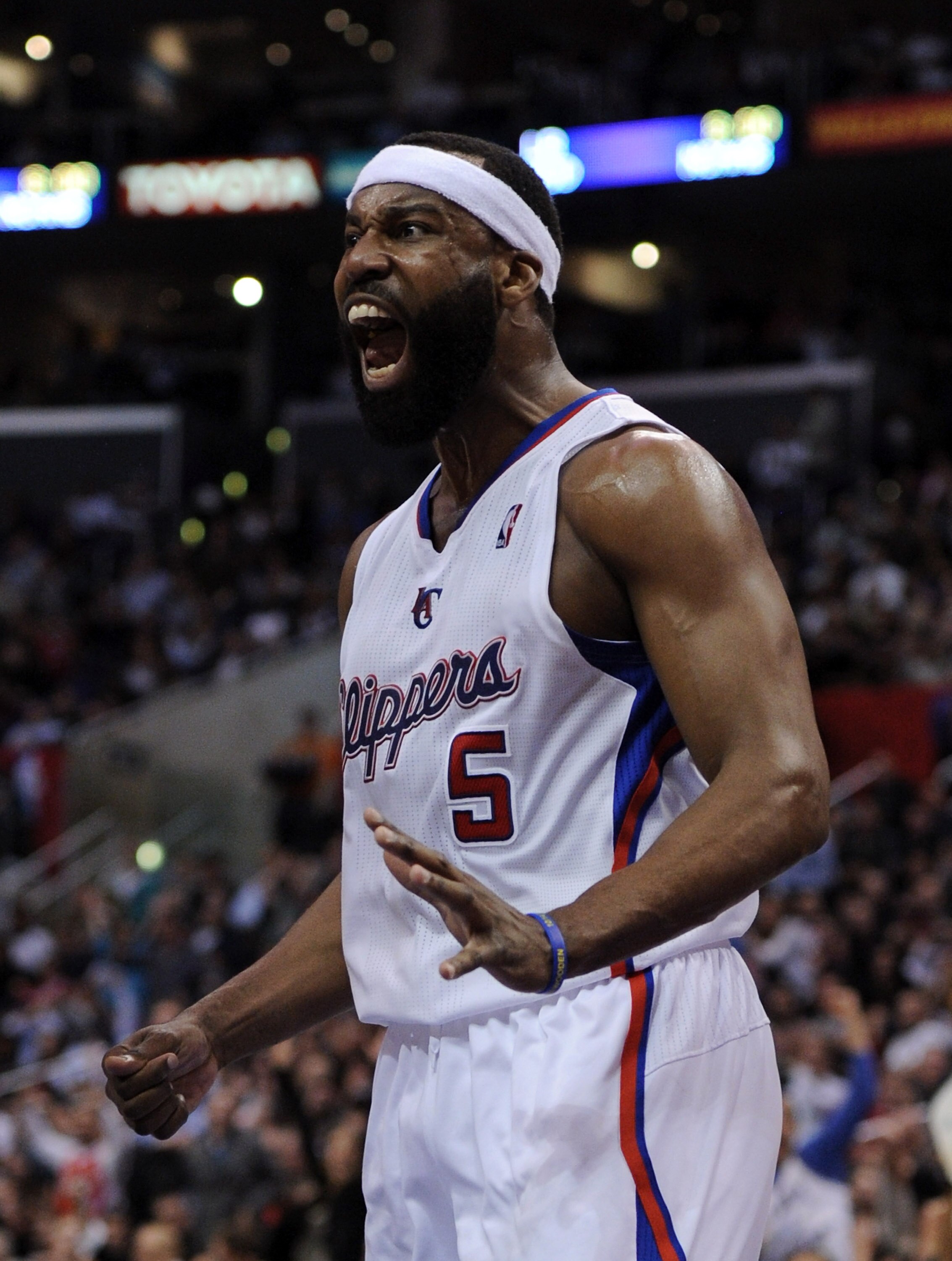 LOS ANGELES, CA - JANUARY 12:  Baron Davis #5 of the Los Angeles Clippers reacts after his dunk against the Miami Heat at Staples Center on January 12, 2011 in Los Angeles, California.  NOTE TO USER: User expressly acknowledges and agrees that, by downloa