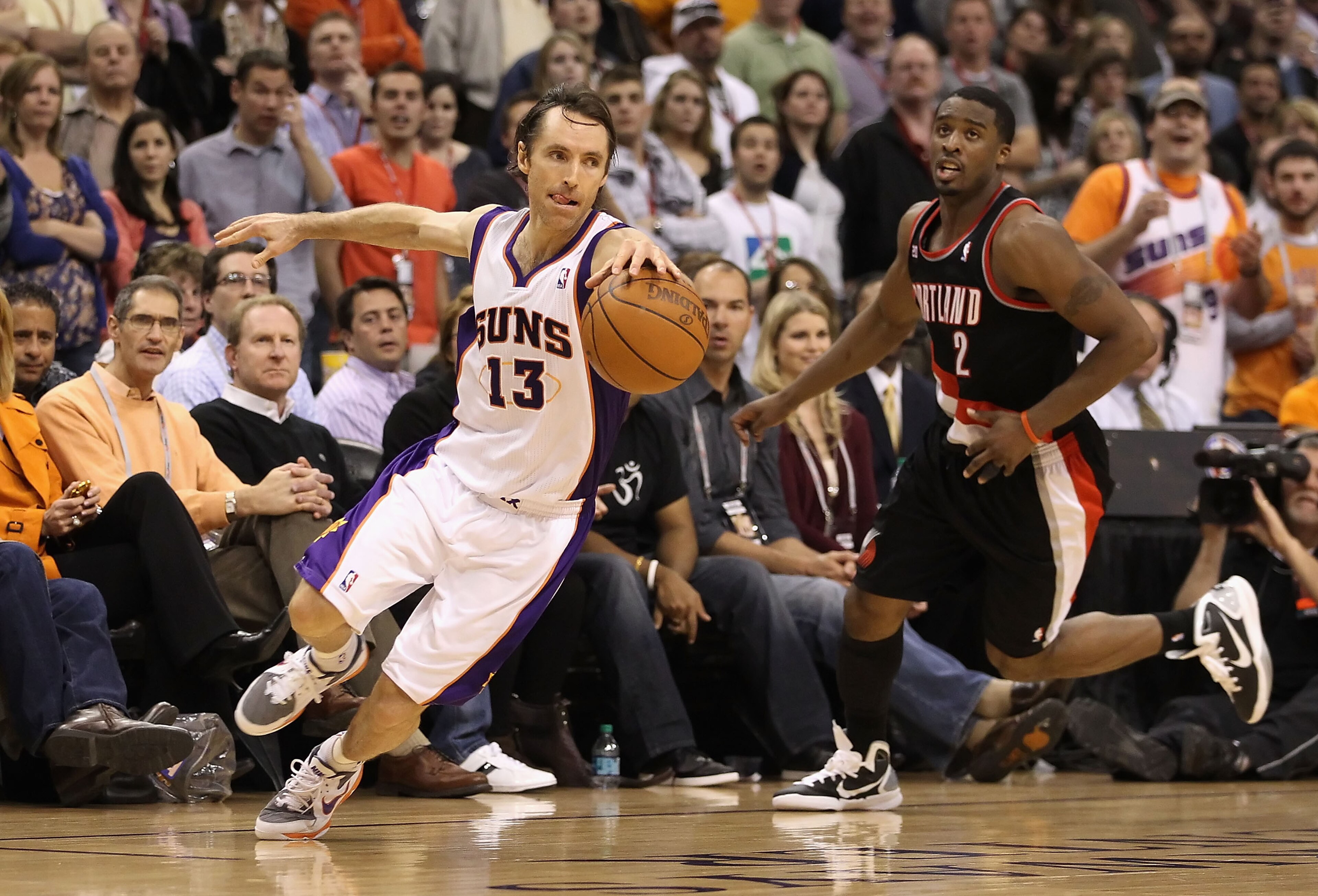 PHOENIX, AZ - JANUARY 14: Steve Nash #13 of the Phoenix Suns handles the ball past Wesley Matthews #2 of the Portland Trail Blazers during the NBA game at US Airways Center on January 14, 2011 in Phoenix, Arizona. The Suns defeated the Trail Blazers 115 PHOENIX, AZ - JANUARY 14: Steve Nash #13 of the Phoenix Suns handles the ball past Wesley Matthews #2 of the Portland Trail Blazers during the NBA game at US Airways Center on January 14, 2011 in Phoenix, Arizona. The Suns defeated the Trail Blazers 115
