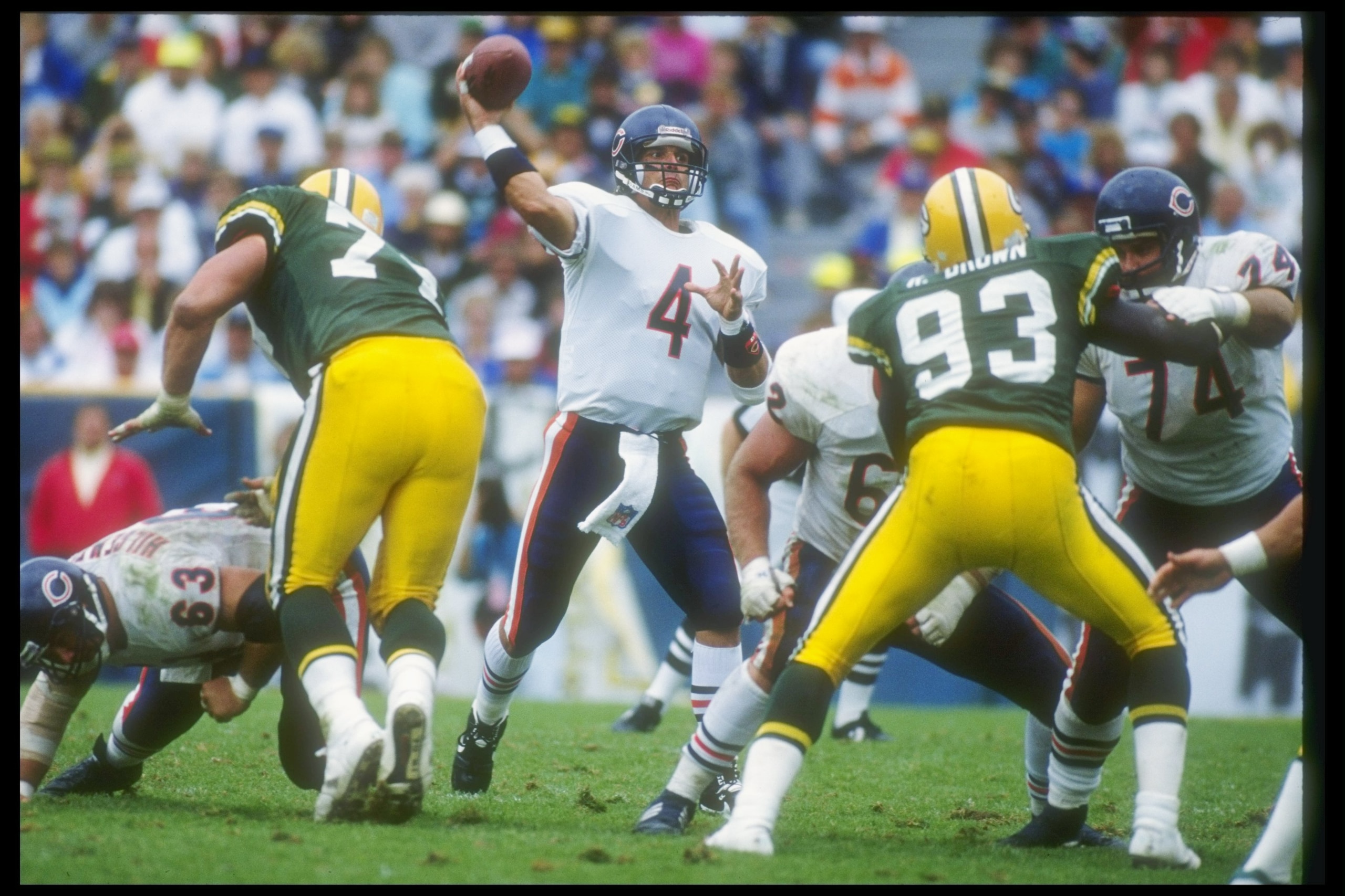 16 Sep 1990: Quarterback Jim Harbaugh of the Chicago Bears passes the ball during a game against the Green Bay Packers at Lambeau Field in Green Bay, Wisconsin. The Bears won the game, 31-13.