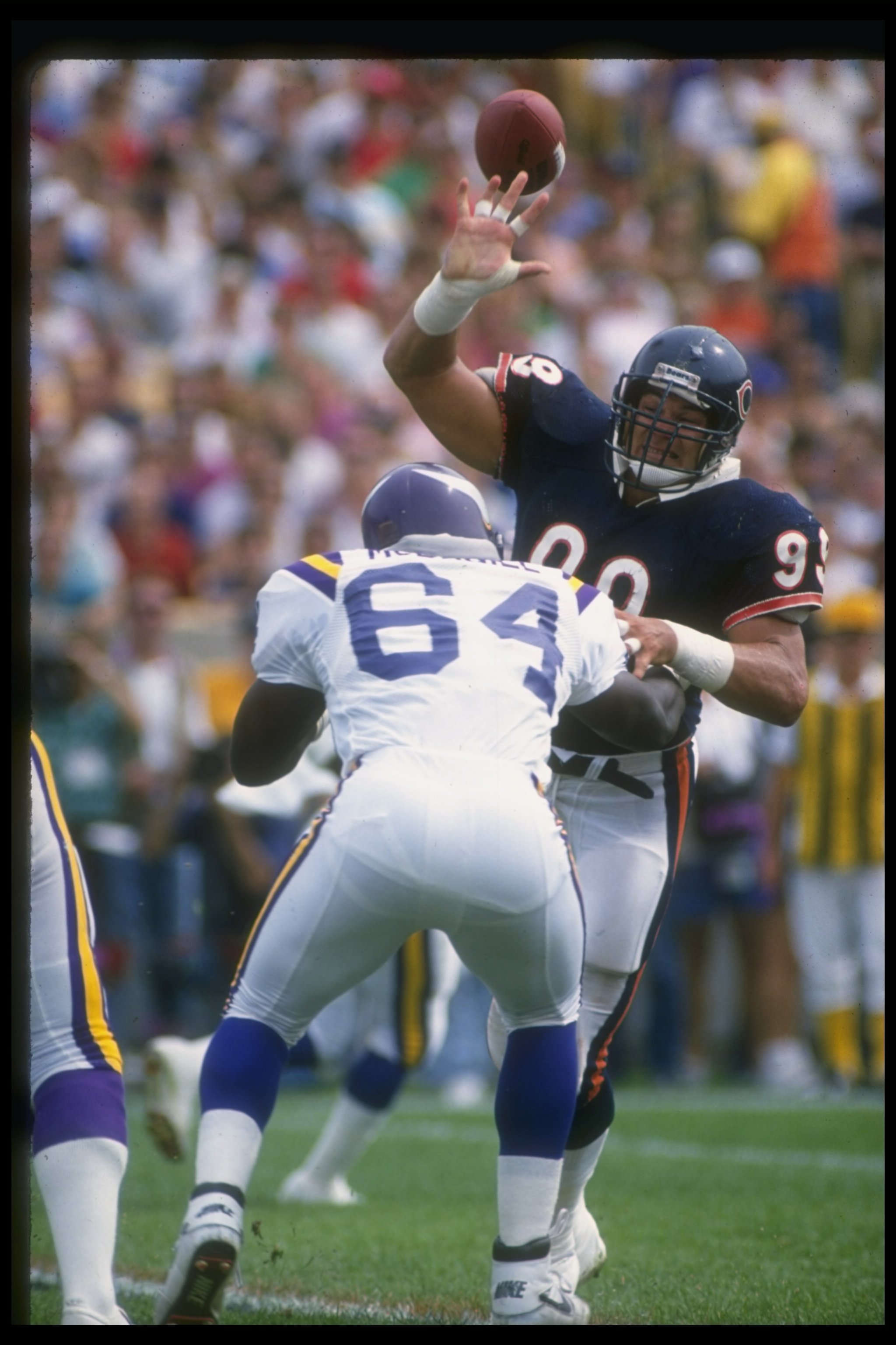 18 Sep 1988: Defensive lineman Dan Hampton of the Chicago Bears, right, in action against offensive lineman Randall McDaniel of the Minnesota Vikings at Soldier Field in Chicago, Illinois. The Vikings won the game 31-7.