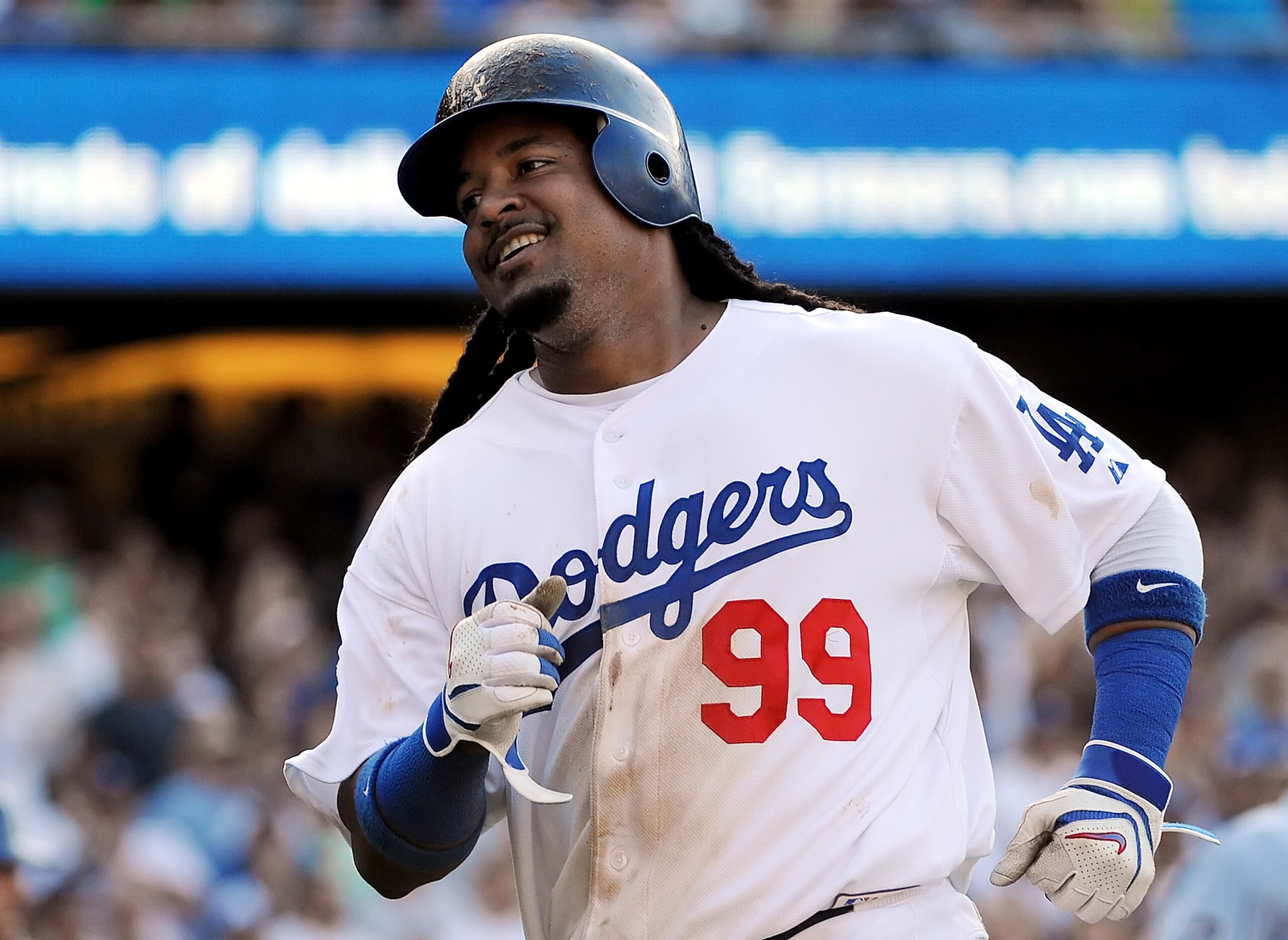 LOS ANGELES - JUNE 26: Manny Ramirez #99 of the Los Angeles Dodgers scores in the fourth inning against the New York Yankees on June 26, 2010 at Dodger Stadium in Los Angeles, California. (Photo by Lisa Blumenfeld/Getty Images) LOS ANGELES - JUNE 26: Manny Ramirez #99 of the Los Angeles Dodgers scores in the fourth inning against the New York Yankees on June 26, 2010 at Dodger Stadium in Los Angeles, California. (Photo by Lisa Blumenfeld/Getty Images)
