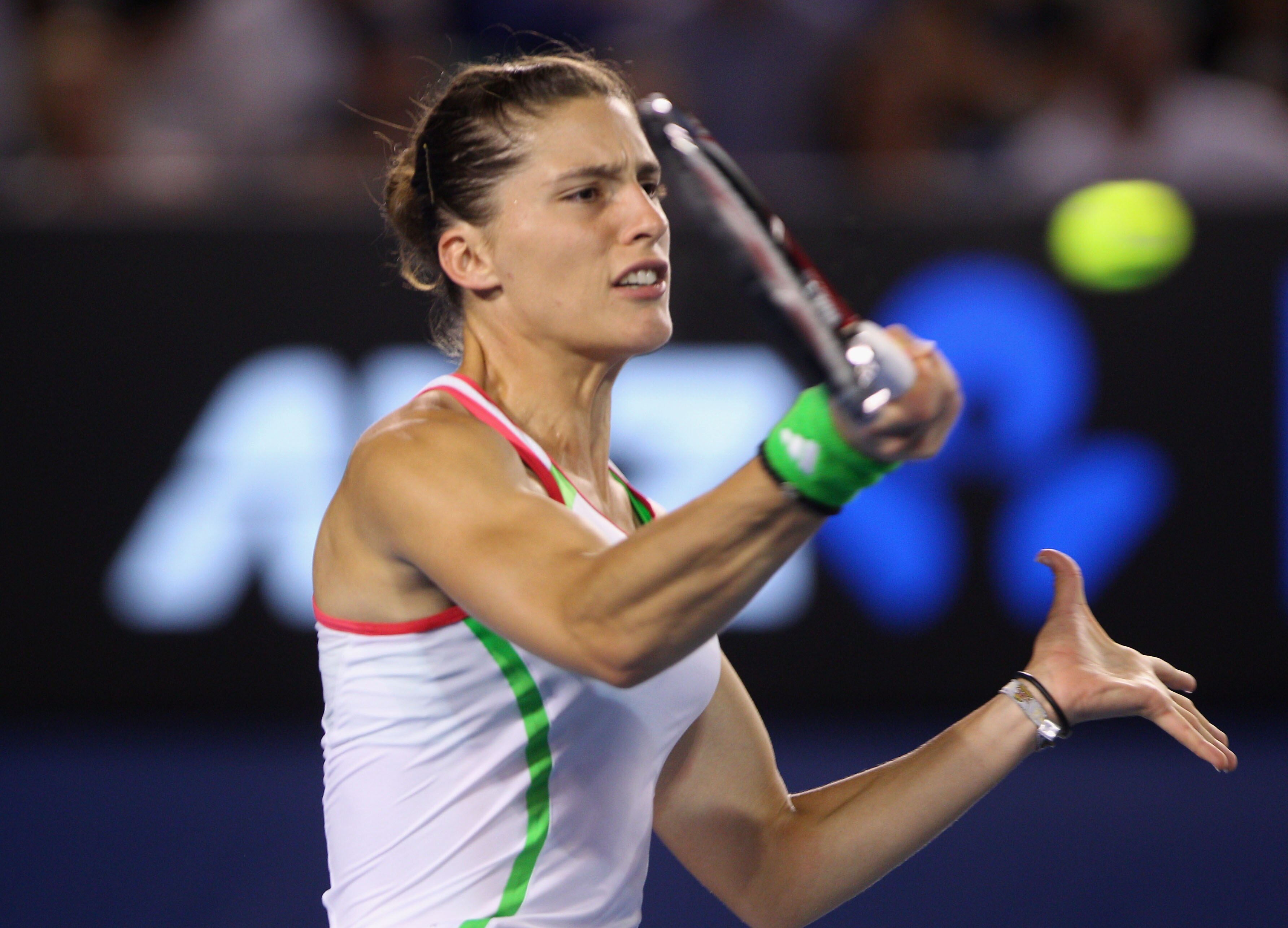 MELBOURNE, AUSTRALIA - JANUARY 21:  Andrea Petkovic of Germany plays a forehand in her third round match against Venus Williams of the United States of America during day five of the 2011 Australian Open at Melbourne Park on January 21, 2011 in Melbourne,