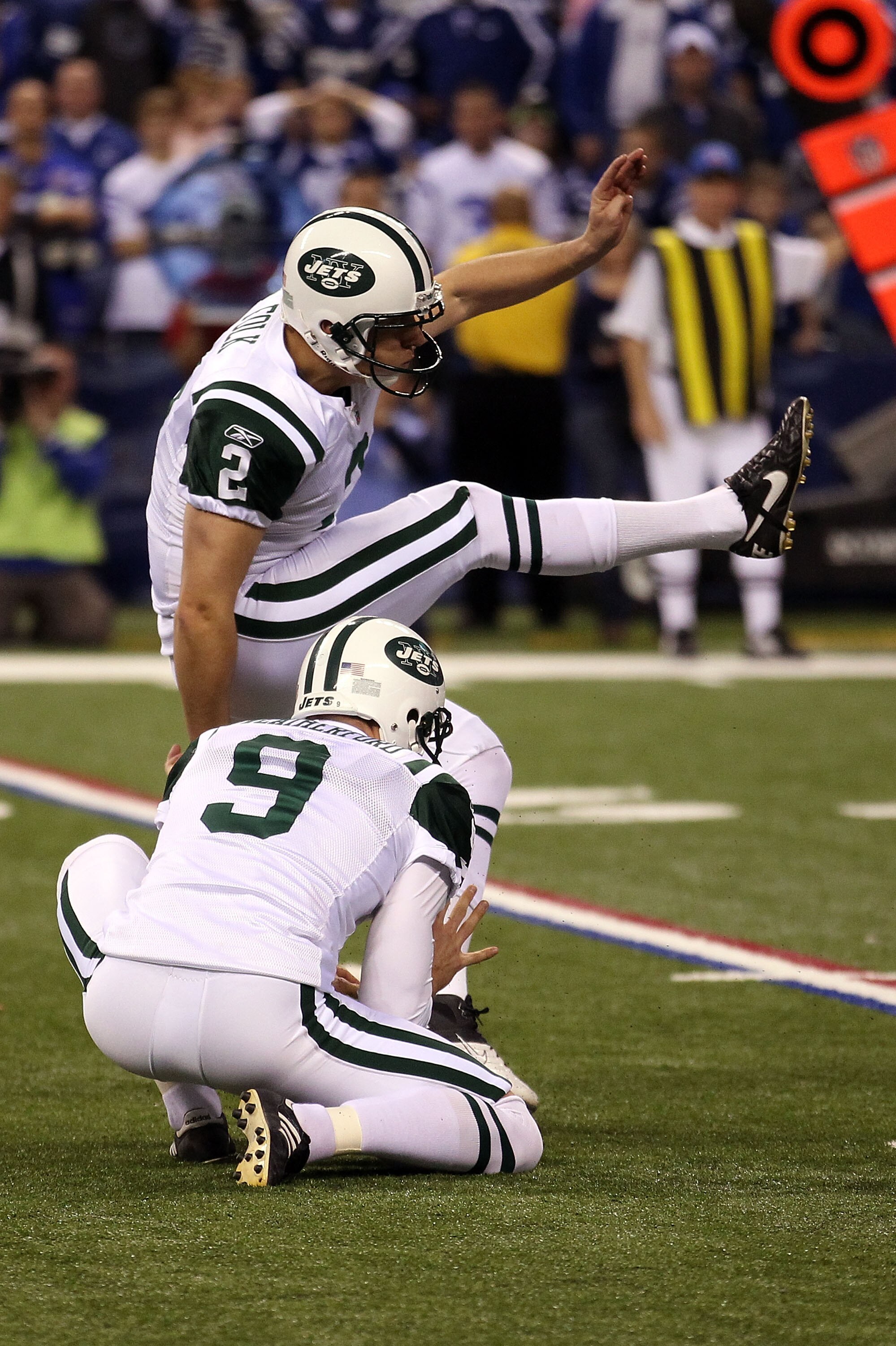 INDIANAPOLIS, IN - JANUARY 08:  Place kicker Nick Folk #2 of the New York Jets successfully kicks a game-winning a 32-yard field goal in the fourth quarter to win 17-16 against the Indianapolis Colts during their 2011 AFC wild card playoff game at Lucas O