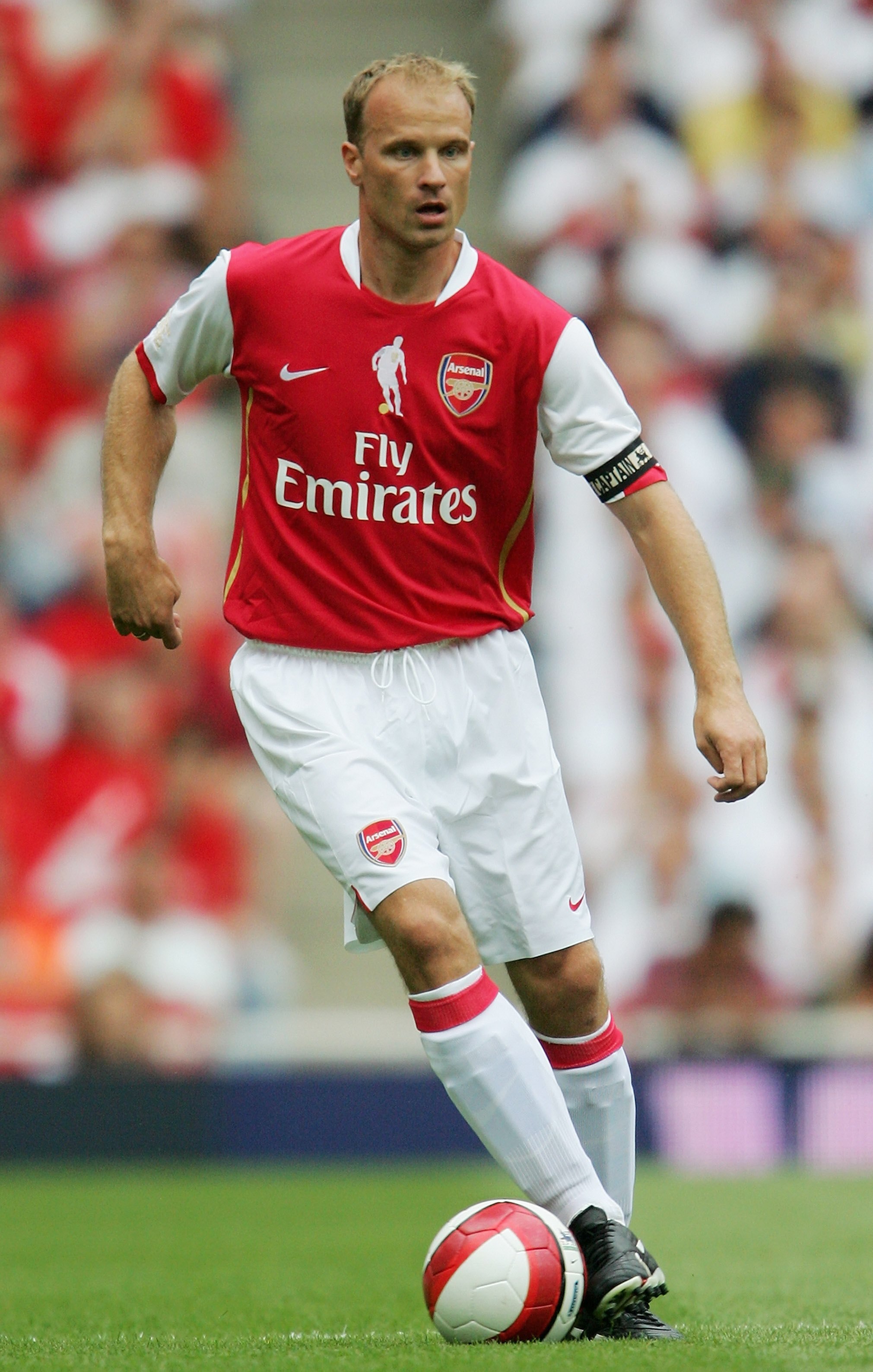 LONDON - JULY 22:  Dennis Bergkamp of Arsenal controls the ball during the Dennis Bergkamp testimonial match between Arsenal and Ajax at the Emirates Stadium on July 22, 2006 in London, England.  (Photo by Jamie McDonald/Getty Images)