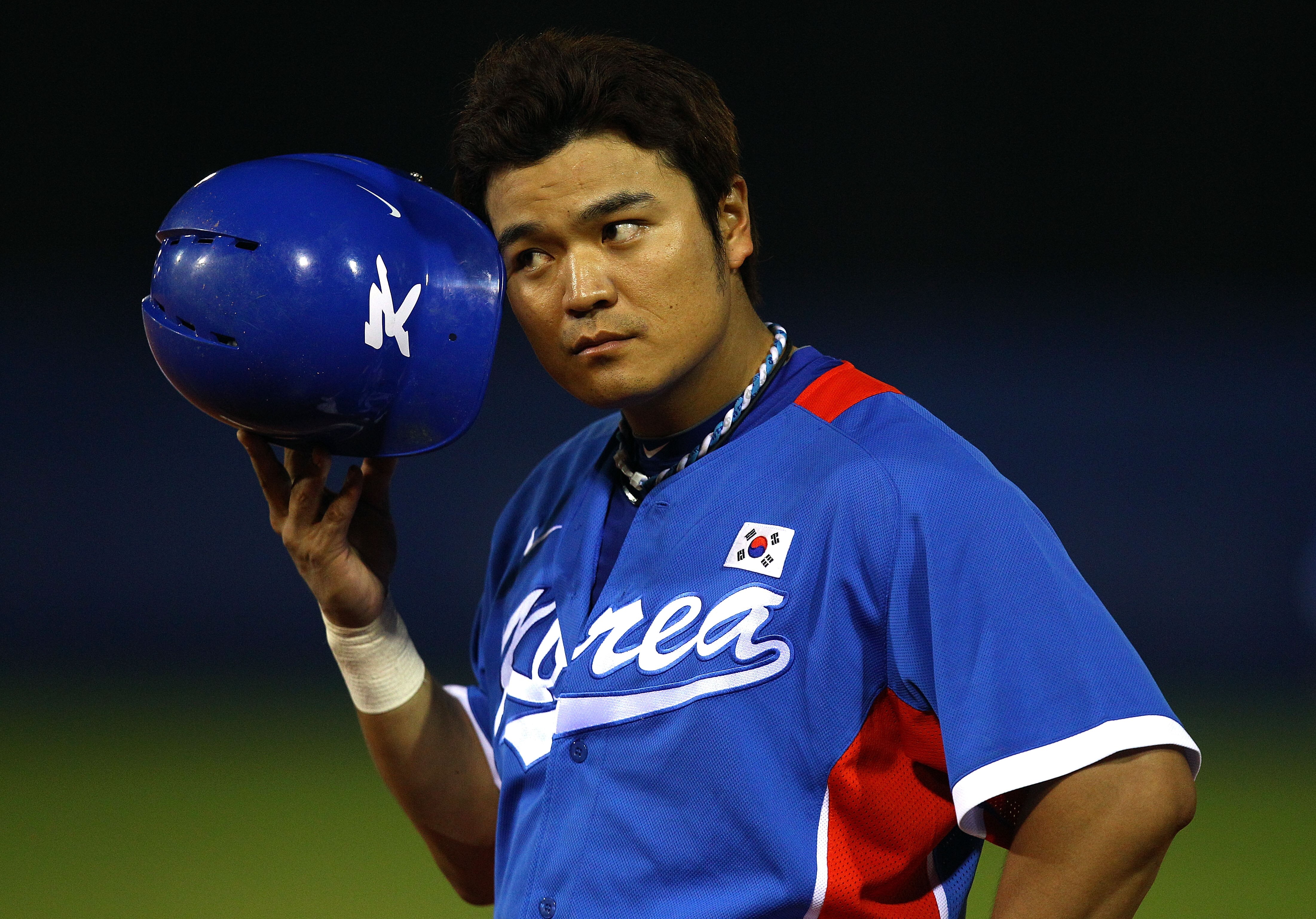 GUANGZHOU, CHINA - NOVEMBER 19:  Shin-soo Choo #17 of South Korea reacts while taking on Chinese Taipei during the gold medal baseball game at Aoti Baseball Field 1 during day seven of the 16th Asian Games Guangzhou 2010 on November 19, 2010 in Guangzhou,