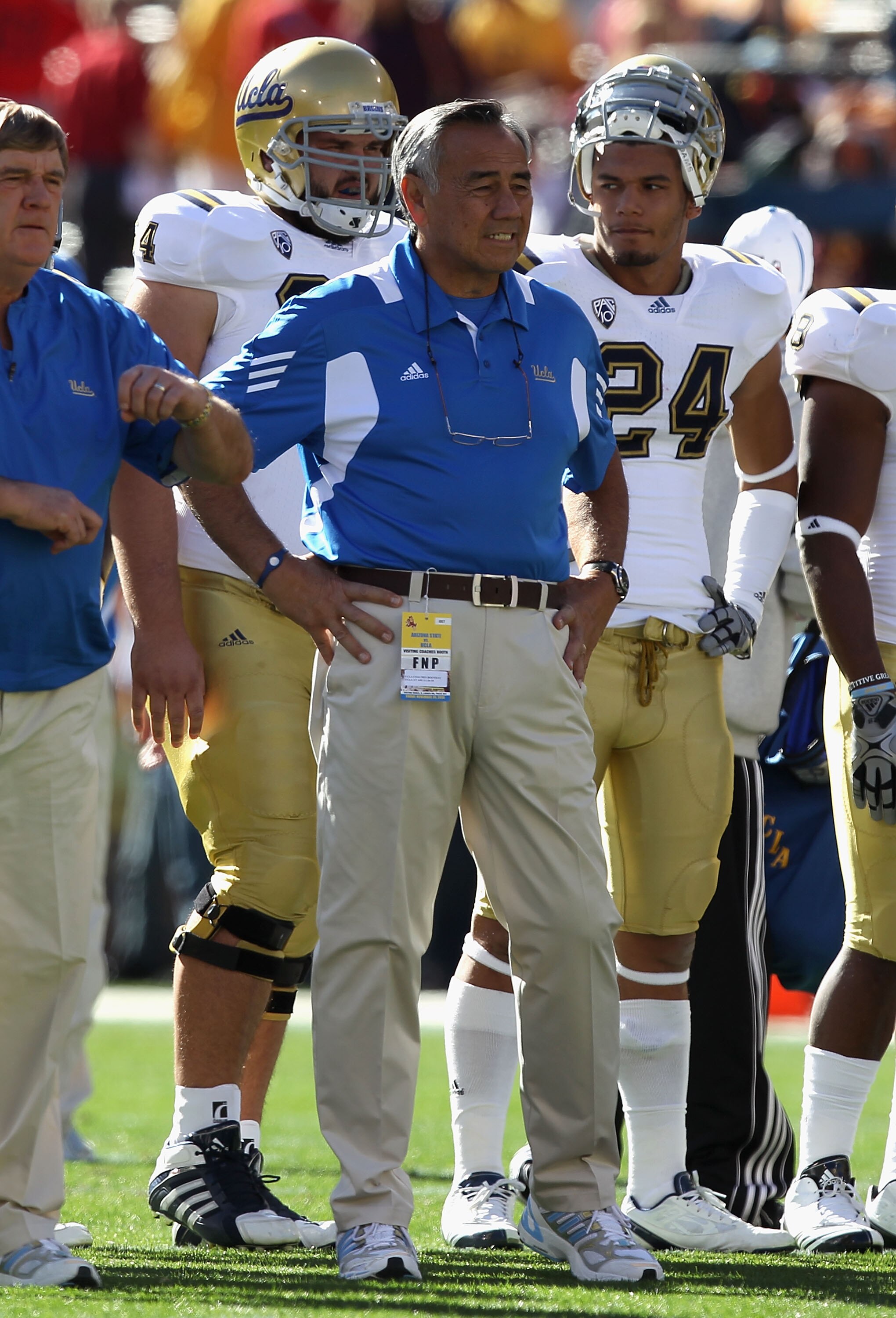 TEMPE, AZ - NOVEMBER 26:  Offensive coordinator Norm Chow of the UCLA Bruins watches warm ups before the college football game against the Arizona State Sun Devils at Sun Devil Stadium on November 26, 2010 in Tempe, Arizona.  (Photo by Christian Petersen/