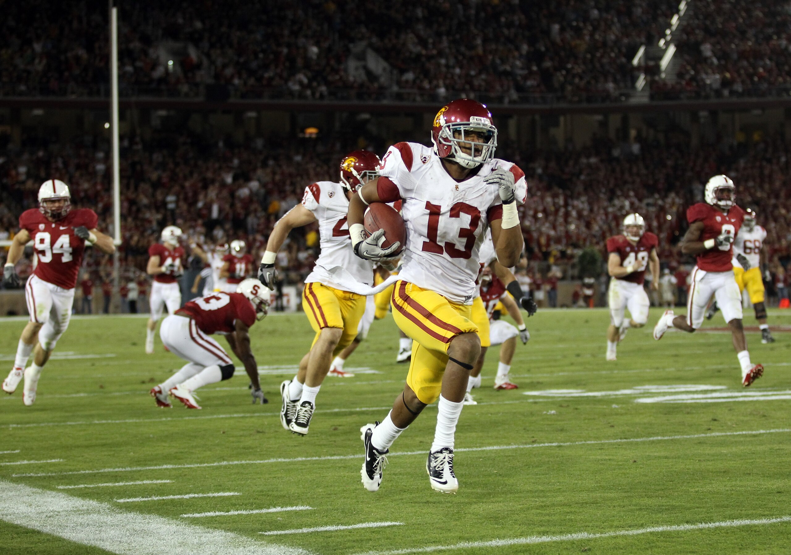 PALO ALTO, CA - OCTOBER 09: Robert Woods #13 of the USC Trojans runs the ball in for a touchdown against the Stanford Cardinal at Stanford Stadium on October 9, 2010 in Palo Alto, California. (Photo by Ezra Shaw/Getty Images) PALO ALTO, CA - OCTOBER 09: Robert Woods #13 of the USC Trojans runs the ball in for a touchdown against the Stanford Cardinal at Stanford Stadium on October 9, 2010 in Palo Alto, California. (Photo by Ezra Shaw/Getty Images)