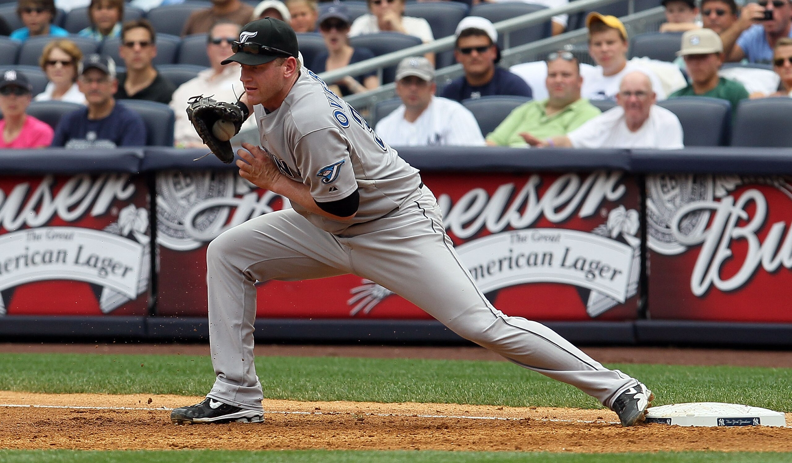 NEW YORK - AUGUST 04:  Lyle Overbay #35 of the Toronto Blue Jays fields the ball against the New York Yankees on August 4, 2010 at Yankee Stadium in the Bronx borough of New York City.  (Photo by Jim McIsaac/Getty Images)