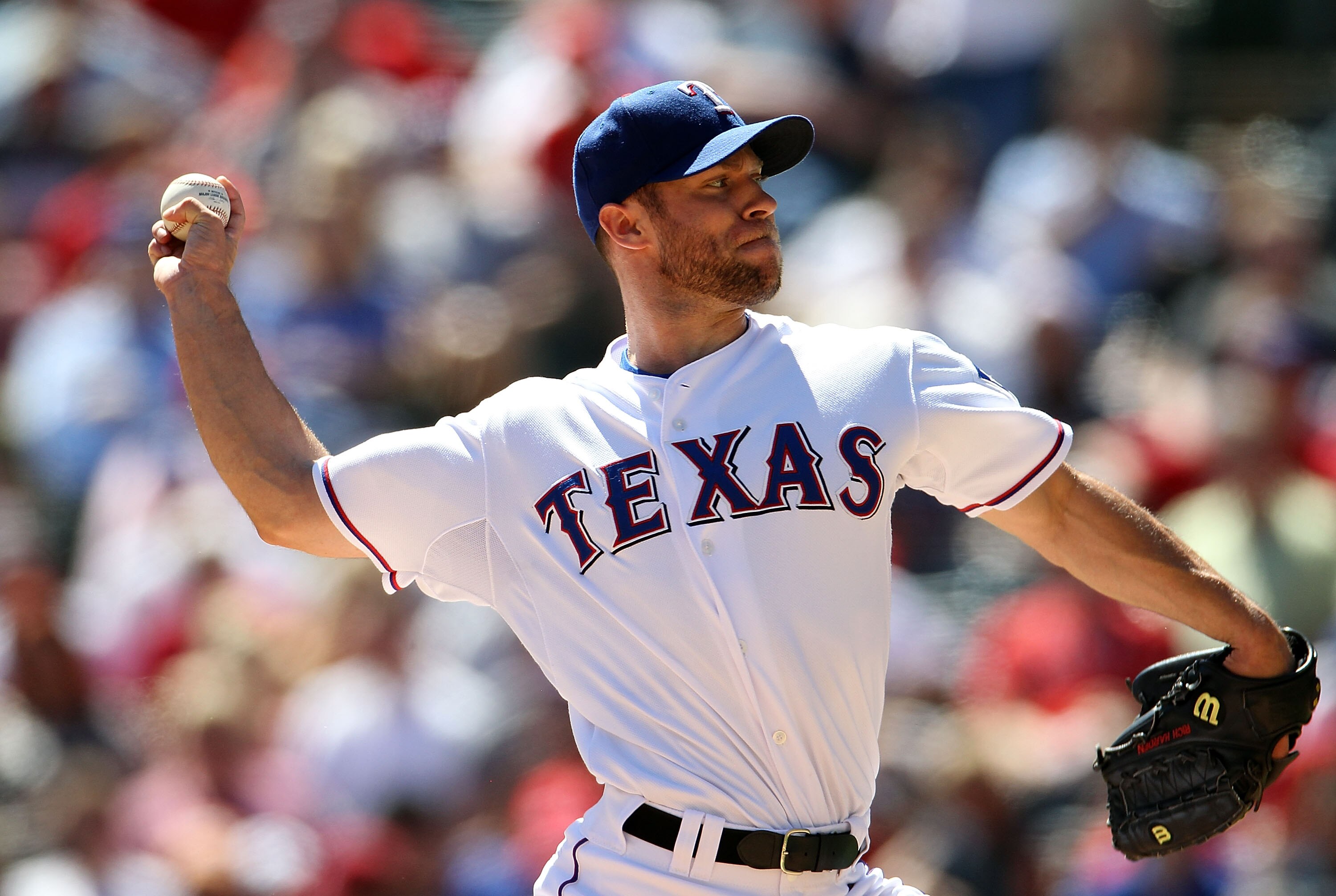 ARLINGTON, TX - SEPTEMBER 29:  Pitcher Rich Harden #40 of the Texas Rangers throws against the Seattle Mariners at Rangers Ballpark in Arlington on September 29, 2010 in Arlington, Texas.  (Photo by Ronald Martinez/Getty Images)