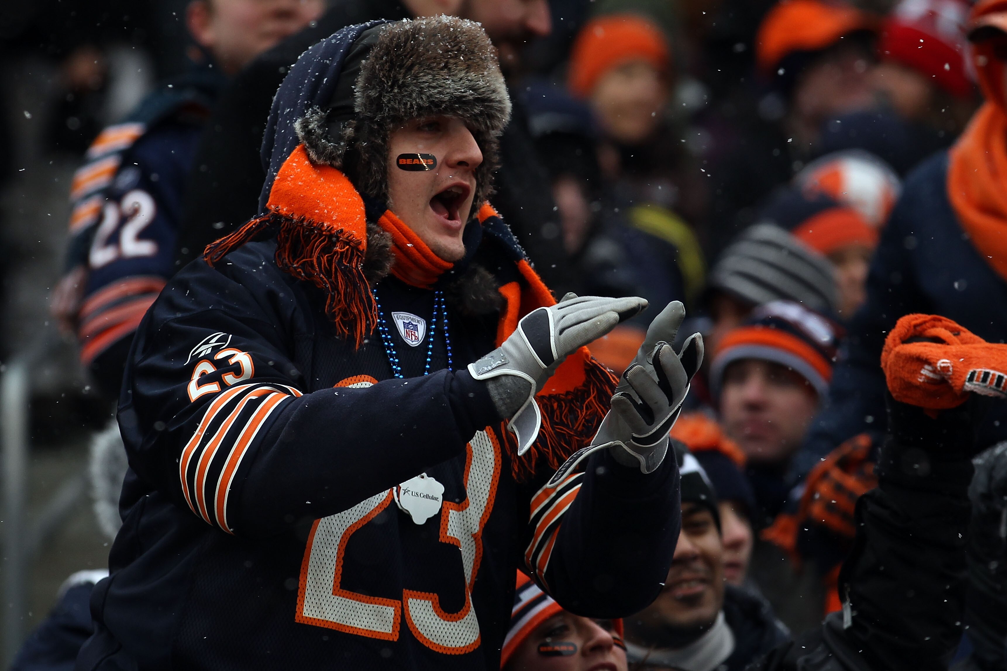 CHICAGO, IL - JANUARY 16:  A Chicago Bears fan cheers against the Seattle Seahawks in the 2011 NFC divisional playoff game at Soldier Field on January 16, 2011 in Chicago, Illinois.  (Photo by Jonathan Daniel/Getty Images)