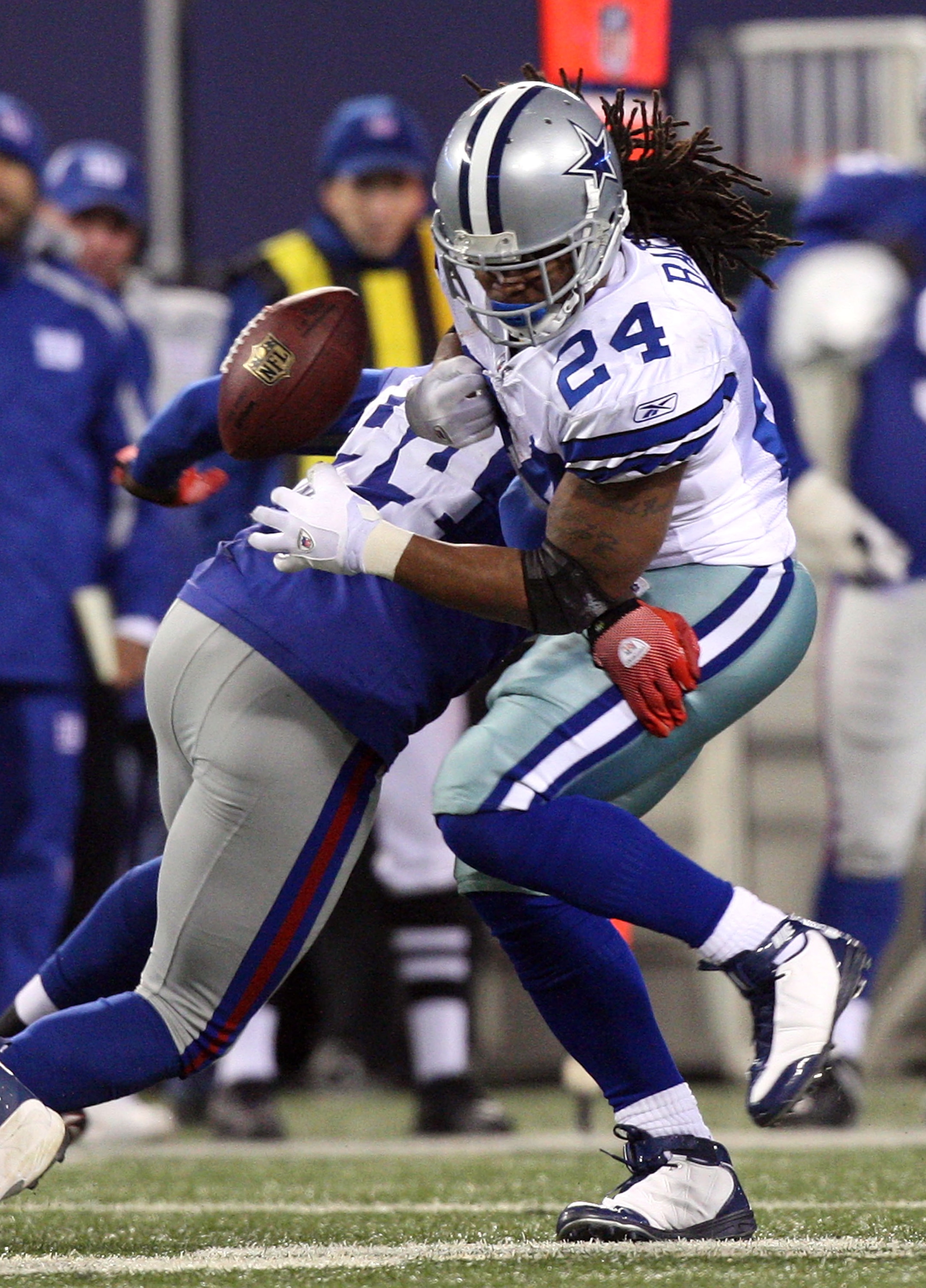 EAST RUTHERFORD, NJ - DECEMBER 06: Marion Barber #24 of the Dallas Cowboys fumbles the ball as he is hit by Mathias Kiwanuka #94 of the New York Giants in the second quarter at Giants Stadium on December 6, 2009 in East Rutherford, New Jersey. (Photo by EAST RUTHERFORD, NJ - DECEMBER 06: Marion Barber #24 of the Dallas Cowboys fumbles the ball as he is hit by Mathias Kiwanuka #94 of the New York Giants in the second quarter at Giants Stadium on December 6, 2009 in East Rutherford, New Jersey. (Photo by
