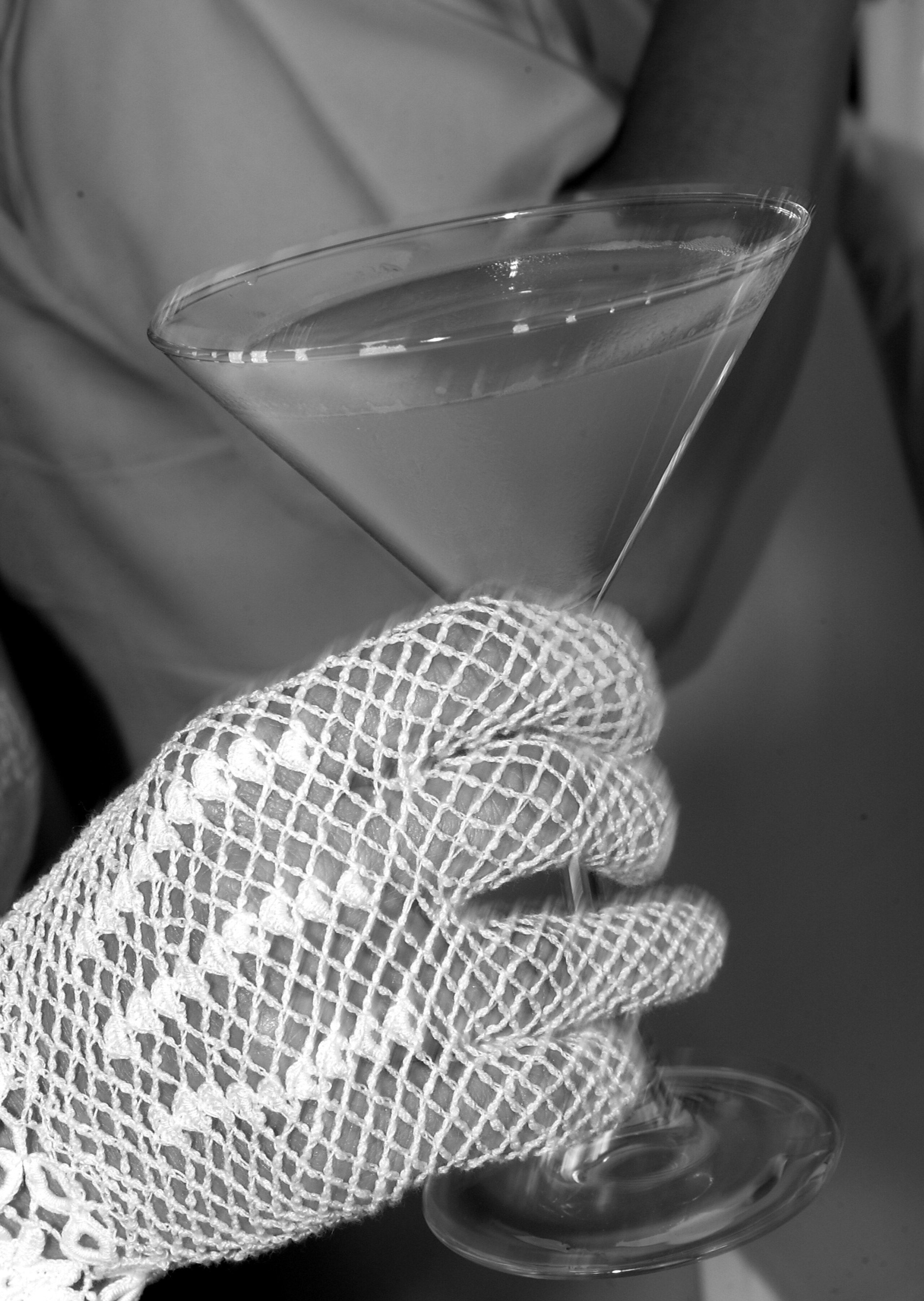 BRIDGEHAMPTON, NY - AUGUST 10:  The glove of a fan drinking a green apple martini during the semifinals of the Merecedes-Benz Cup on August 10, 2002 at the Bridgehampton Polo Club in Bridgehampton, New York. (Photo by Ezra Shaw/Getty Images)