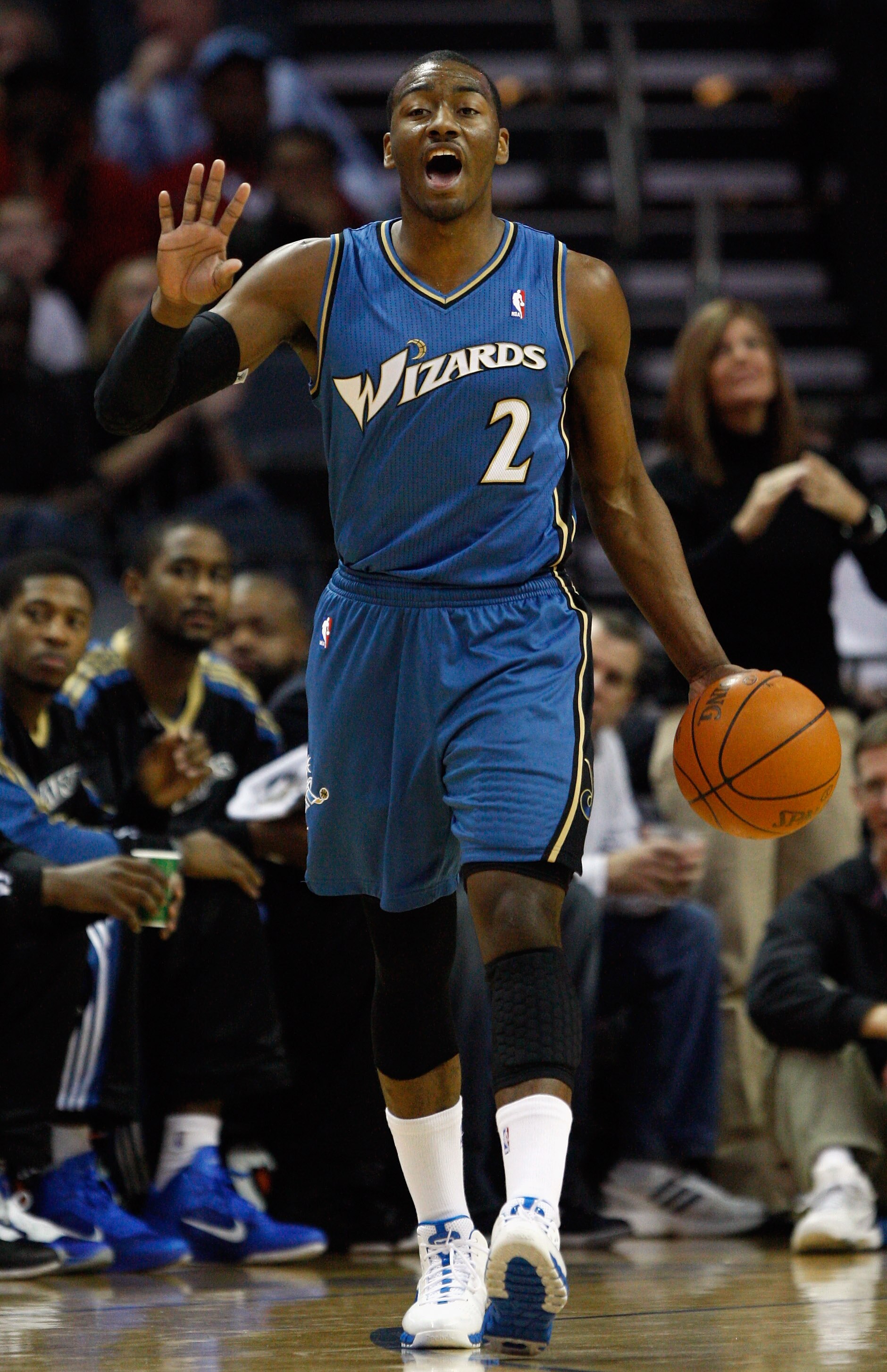 CHARLOTTE, NC - JANUARY 08:  John Wall #2 of the Washington Wizards calls a play against the Charlotte Bobcats during their game at Time Warner Cable Arena on January 8, 2011 in Charlotte, North Carolina. NOTE TO USER: User expressly acknowledges and agre