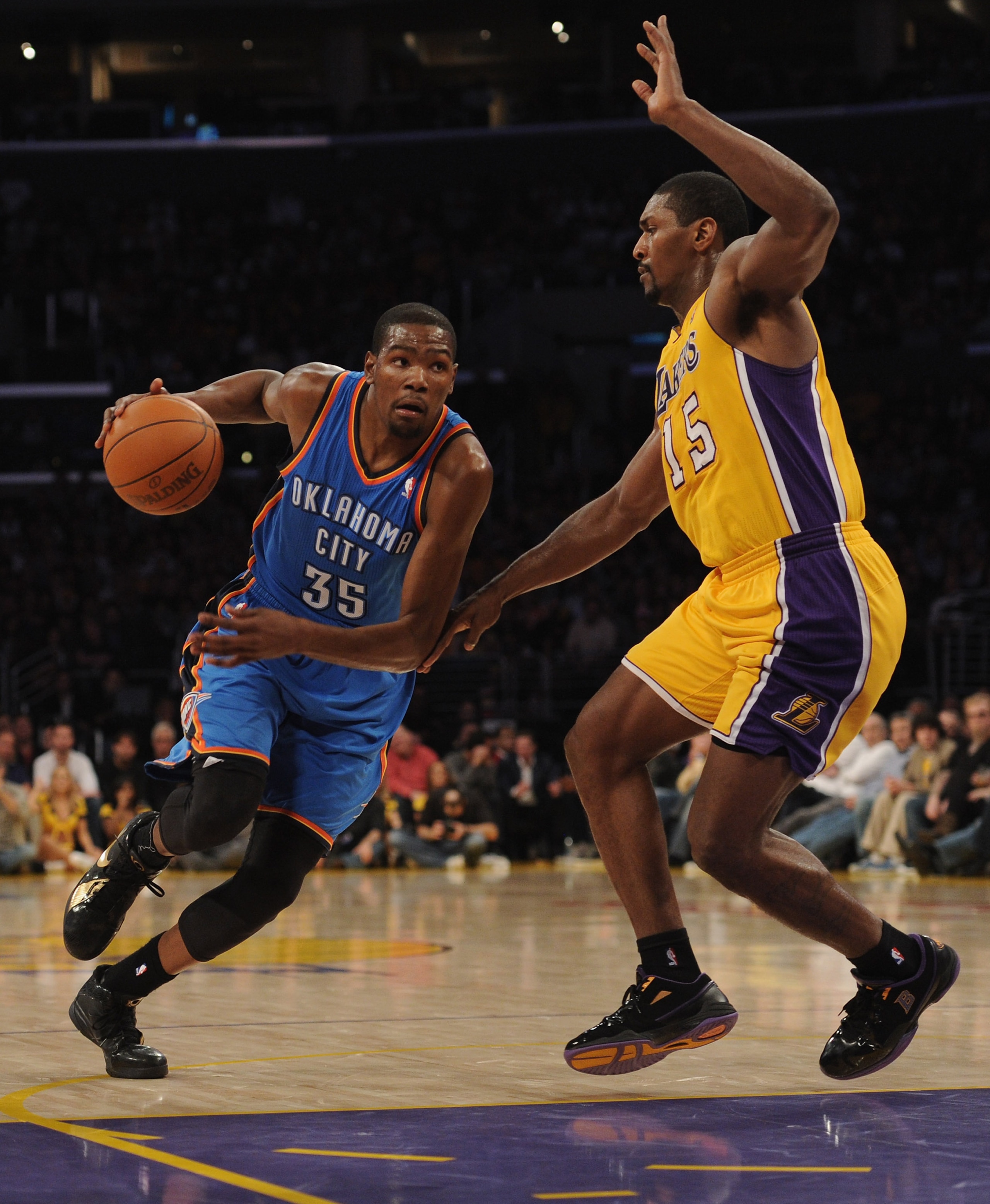 LOS ANGELES, CA - JANUARY 17: Kevin Durant #35 of the Oklahoma City Thunder dribbles to the basket around Ron Artest #15 of the Los Angeles Lakers at the Staples Center on January 17, 2011 in Los Angeles, California. NOTE TO USER: User expressly acknow LOS ANGELES, CA - JANUARY 17: Kevin Durant #35 of the Oklahoma City Thunder dribbles to the basket around Ron Artest #15 of the Los Angeles Lakers at the Staples Center on January 17, 2011 in Los Angeles, California. NOTE TO USER: User expressly acknow