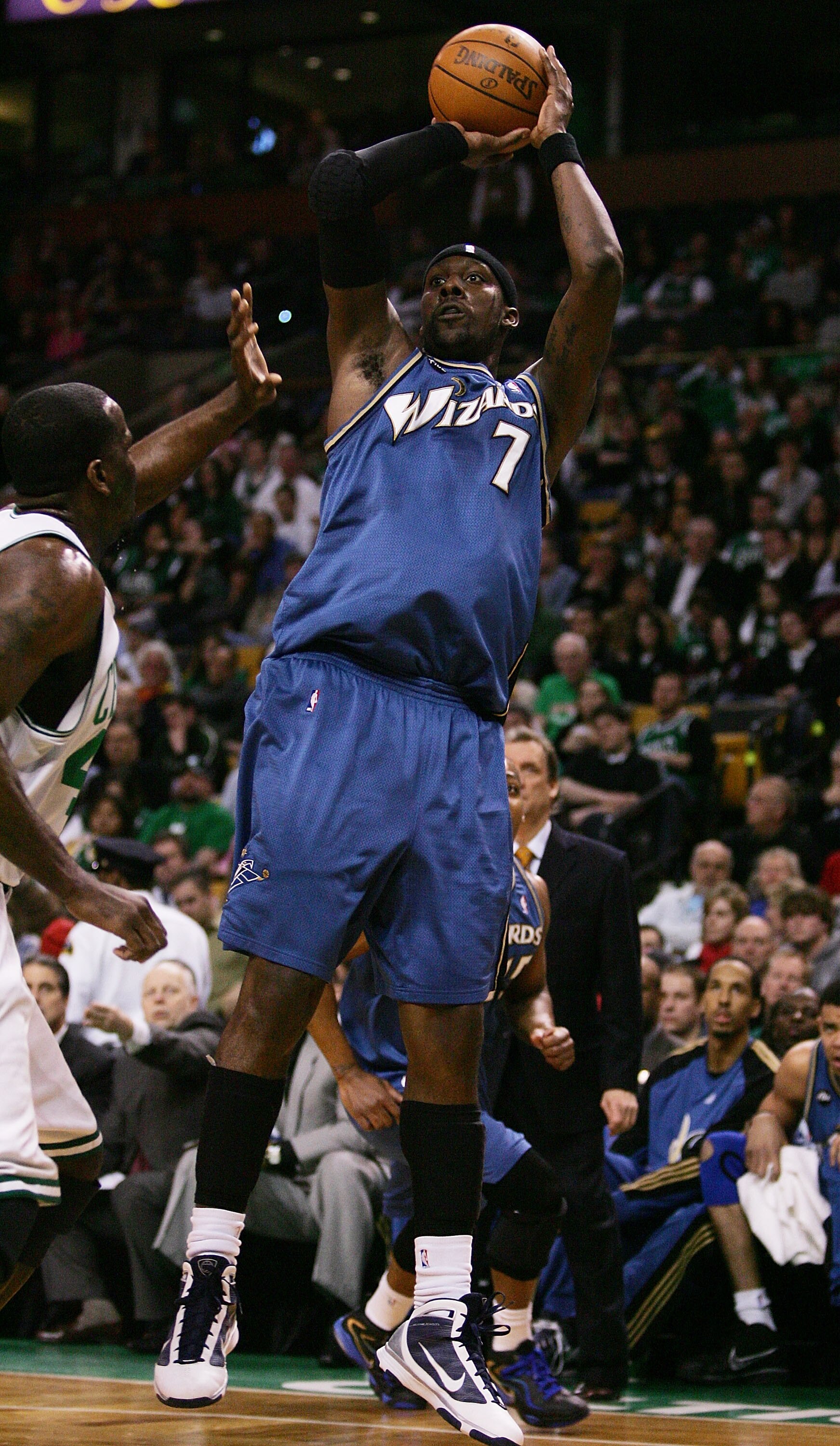 BOSTON - MARCH 07:  Andray Blatche #7 of the Washington Wizards takes a shot as Kendrick Perkins #43 of the Boston Celtics defends on March 7, 2010 at the TD Garden in Boston, Massachusetts.  NOTE TO USER: User expressly acknowledges and agrees that, by d