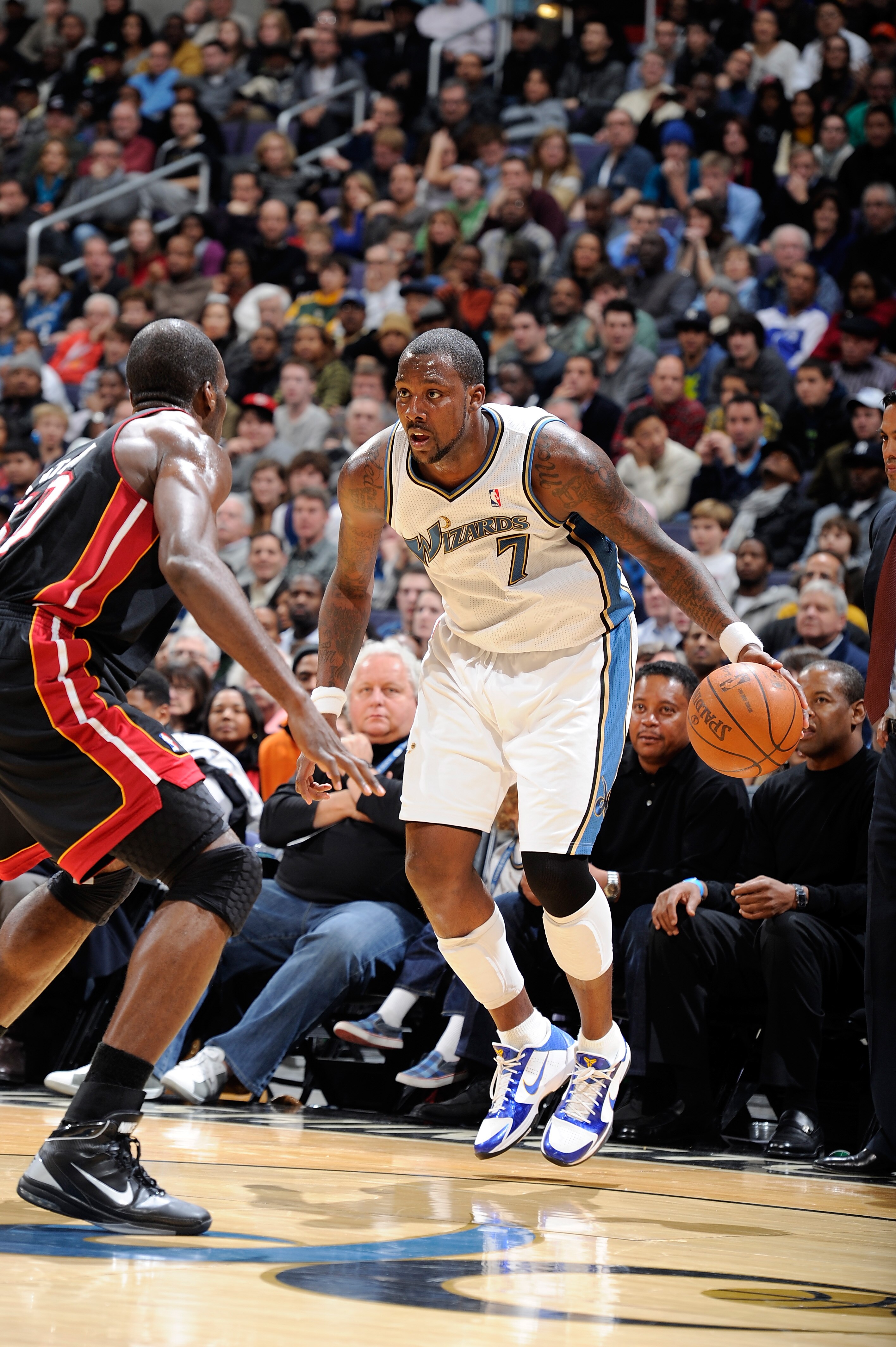 WASHINGTON, DC - DECEMBER 18:  Andray Blatche #7 of the Washington Wizards handles the ball against the Miami Heat at the Verizon Center on December 18, 2010 in Washington, DC. NOTE TO USER: User expressly acknowledges and agrees that, by downloading and