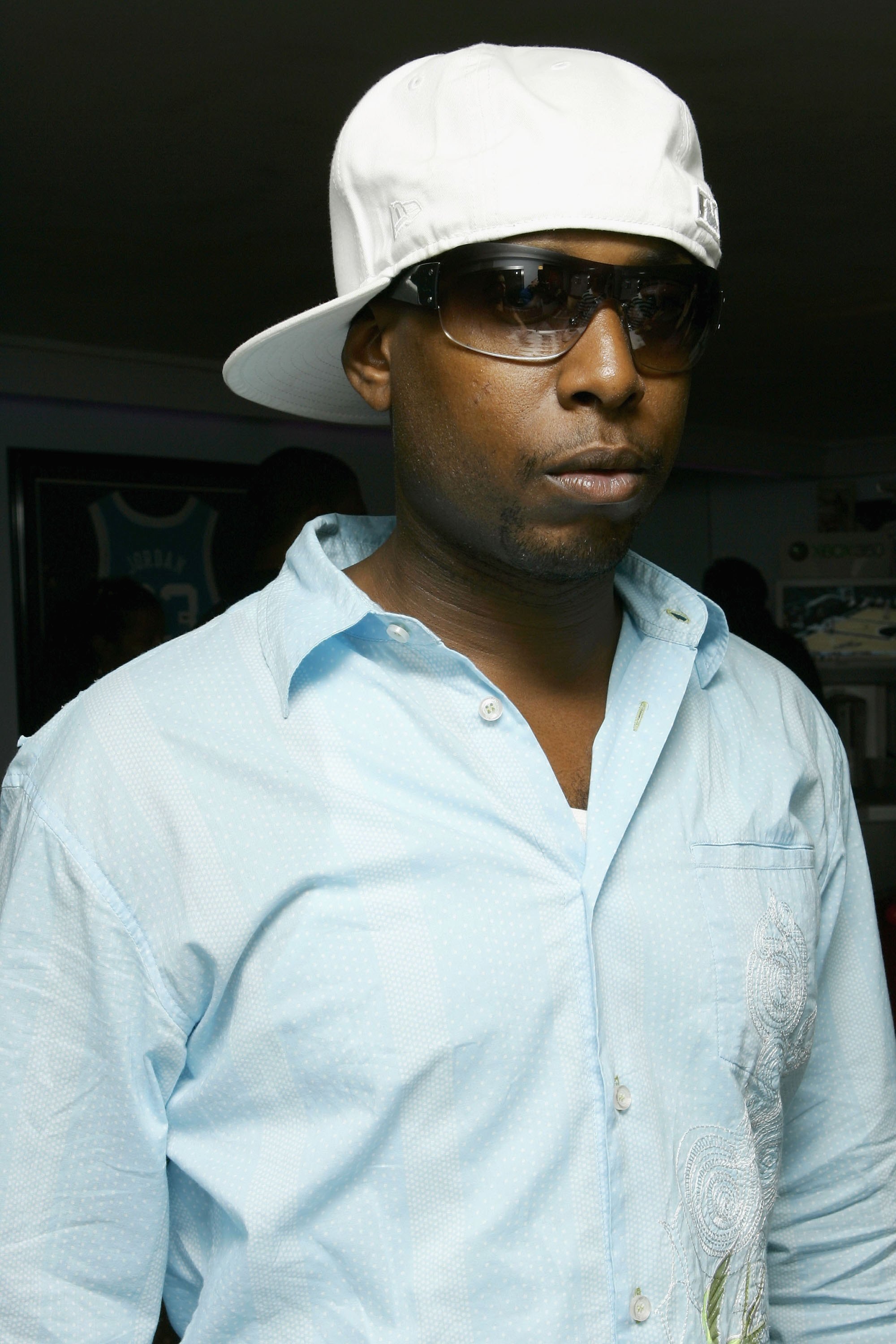 NEW YORK - JUNE 27: Rapper Talib Kweli poses while wearing Prada Linea Rossa sunglasses at the NBA Pre-Draft Party at the 40/40 Club on June 27, 2006 in New York City. (Photo by Mat Szwajkos/Getty Images for Prada Linea Rossa)