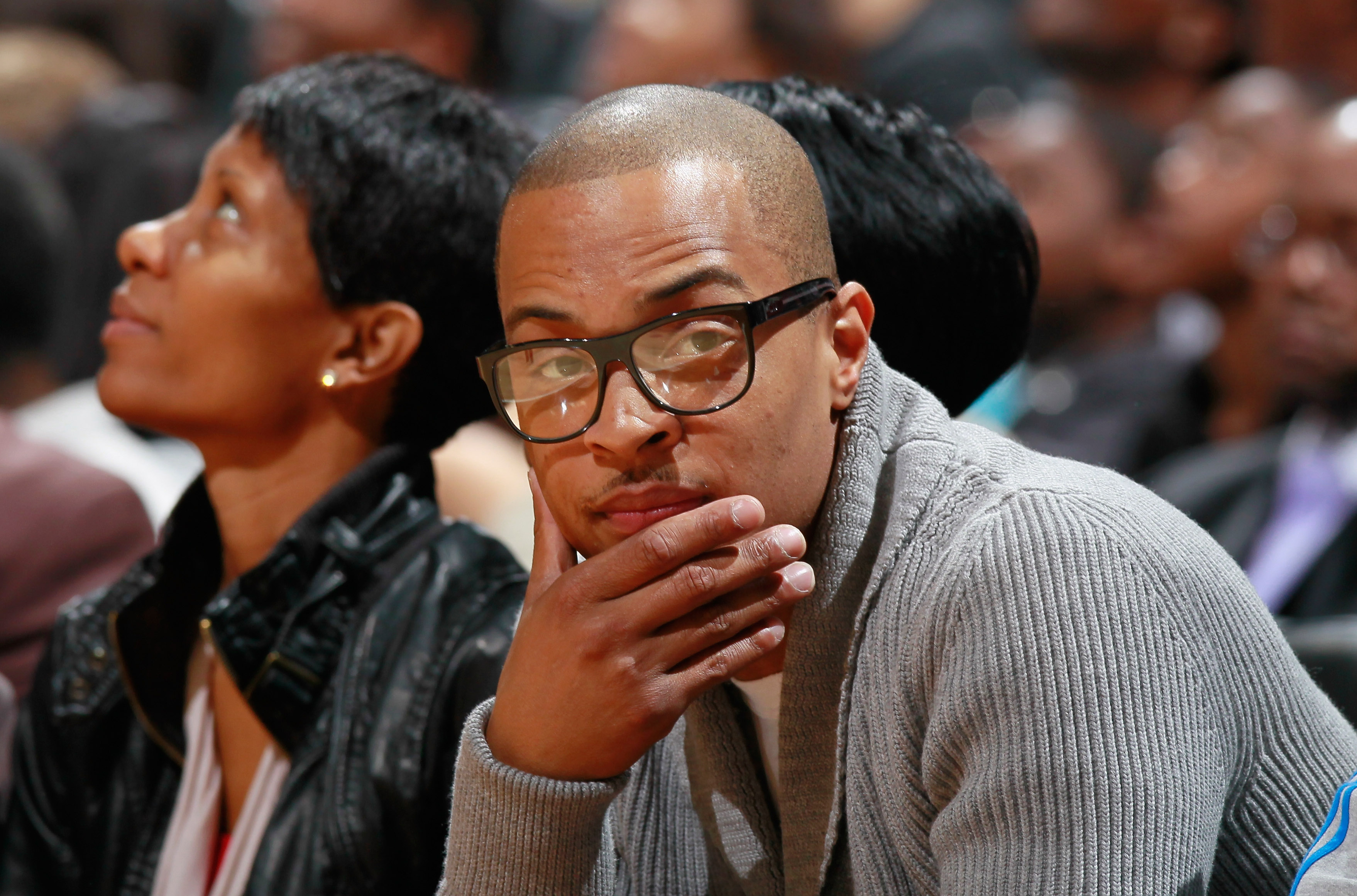 ATLANTA - OCTOBER 21:  Rapper T.I. looks on during the game between the Miami Heat and the Atlanta Hawks at Philips Arena on October 21, 2010 in Atlanta, Georgia.  (Photo by Kevin C. Cox/Getty Images)