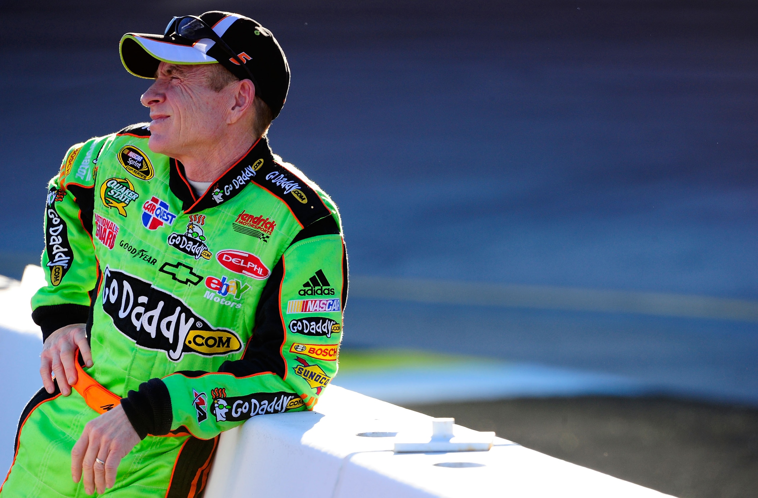 AVONDALE, AZ - NOVEMBER 12:  Mark Martin, driver of the #5 GoDaddy.com Chevrolet, stands on pit road during qualifying for the NASCAR Sprint Cup Series Kobalt Tools 500 at Phoenix International Raceway on November 12, 2010 in Avondale, Arizona.  (Photo by