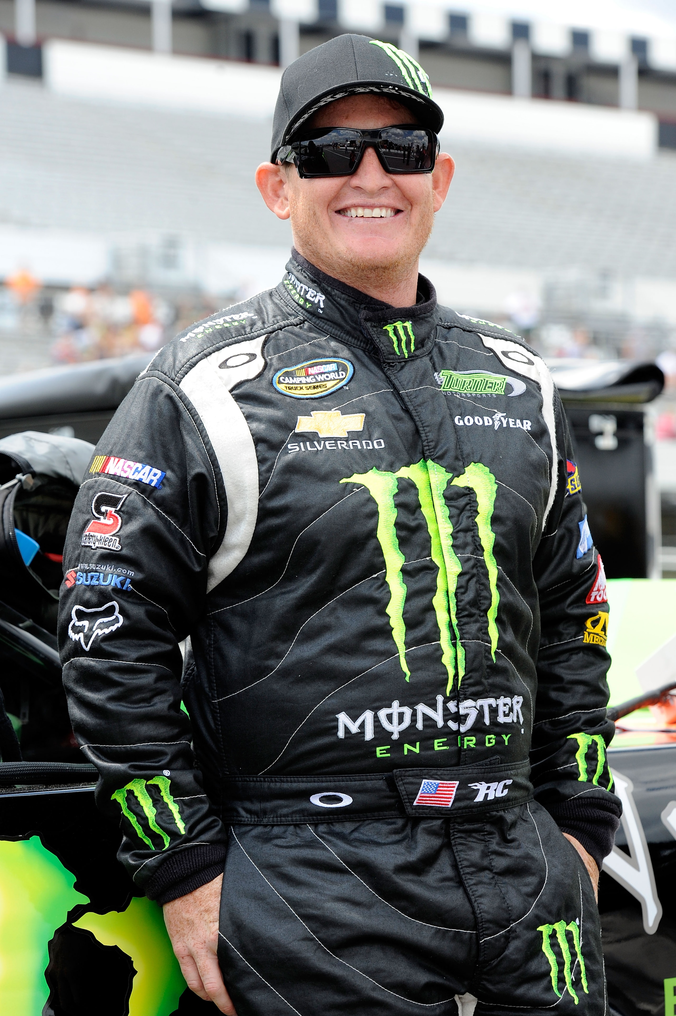 LONG POND, PA - JULY 31:  Ricky Carmichael, driver of the #4 Monster Energy Chevrolet, stands on the grid prior to the start of the NASCAR Camping World Truck Series Pocono Mountains 125 at Pocono Raceway on July 31, 2010 in Long Pond, Pennsylvania.  (Pho