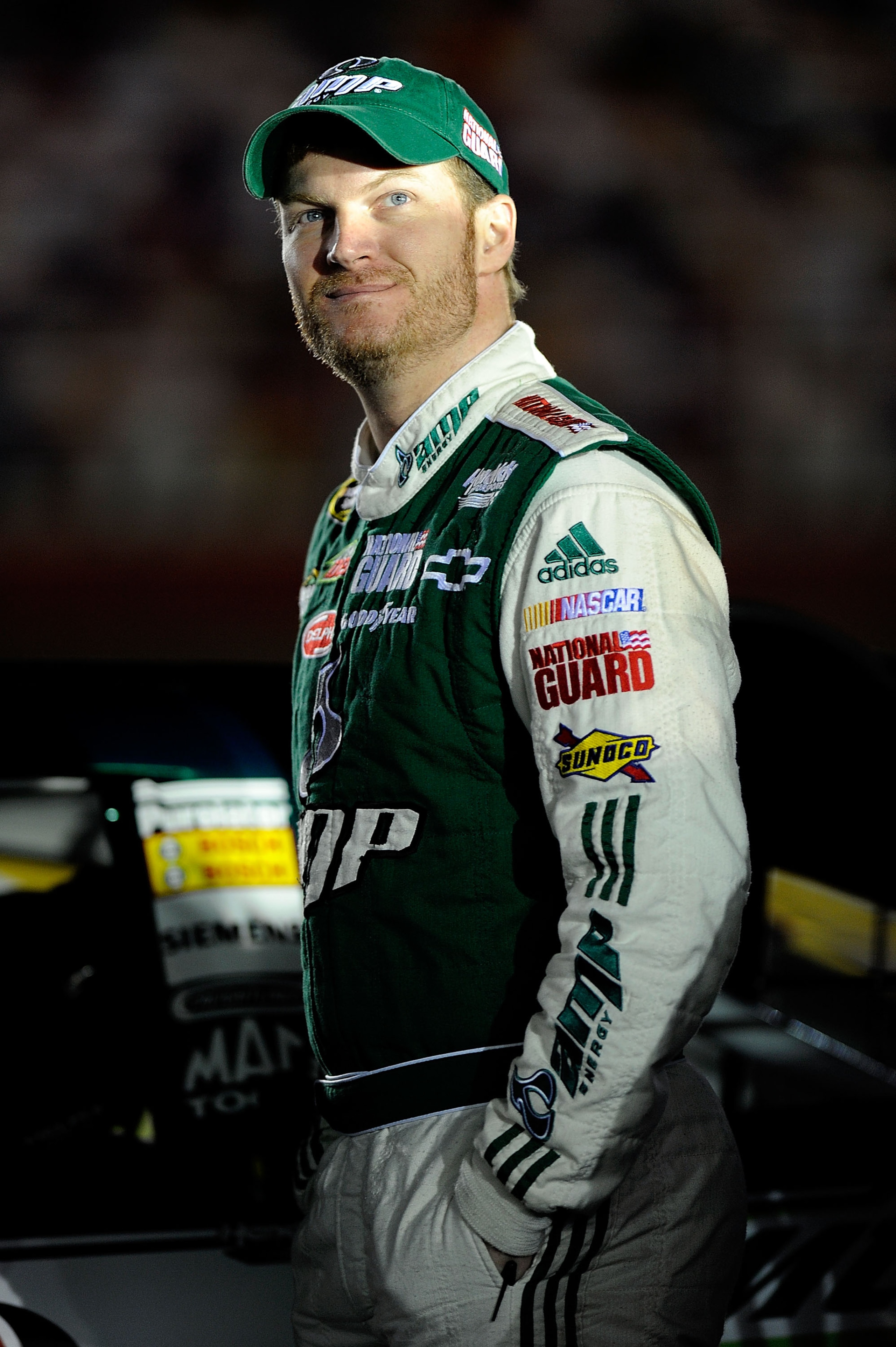 CONCORD, NC - OCTOBER 14:  Dale Earnhardt Jr., drivere of the #88 AMP Energy/Natgional Guard Chevrolet, stands on pit road during qualifying for the NASCAR Sprint Cup Series Bank of America 500 at Charlotte Motor Speedway on October 14, 2010 in Concord, N