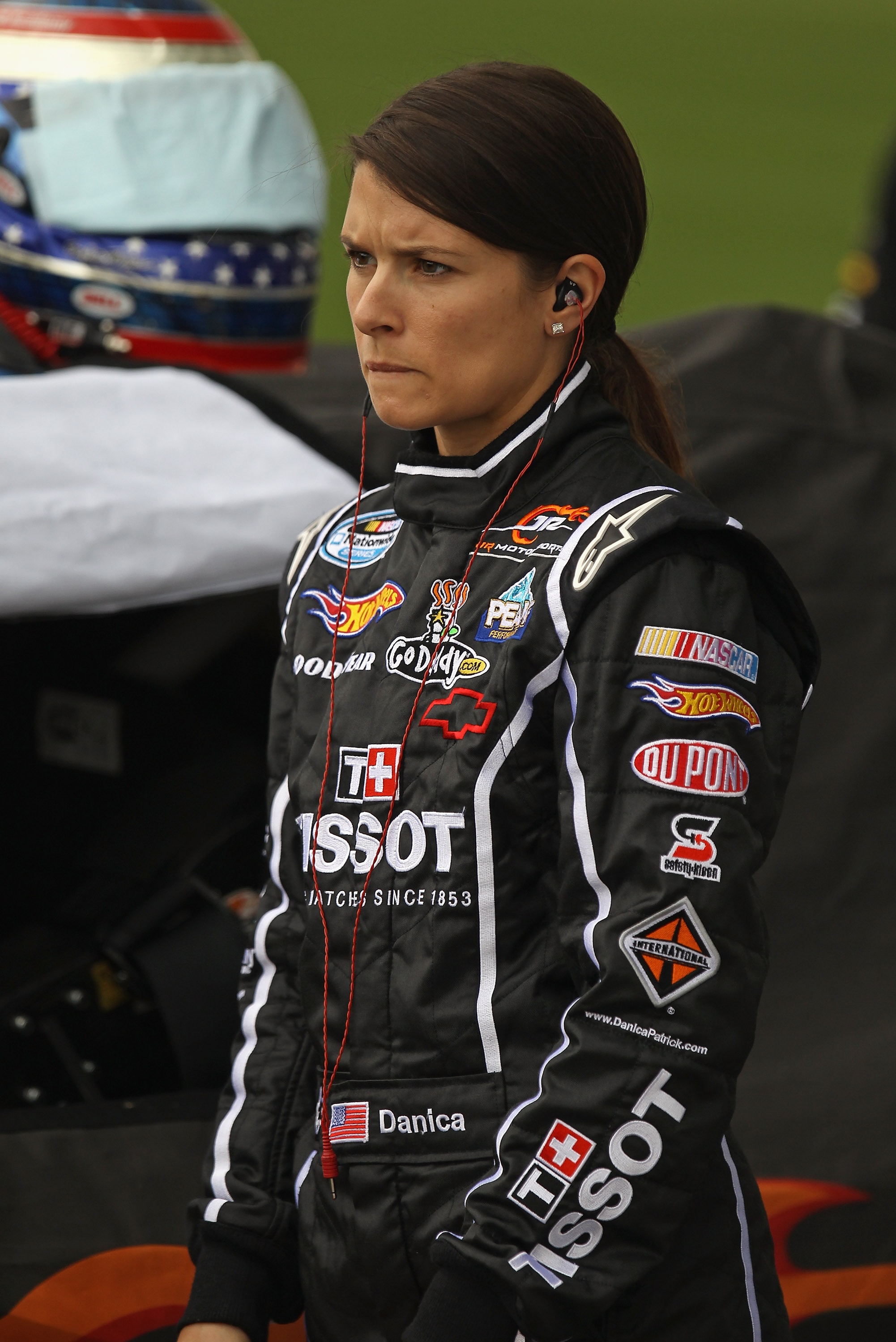 JOLIET, IL - JUNE 04:  Danica Patrick, driver of the #7 Tissot/GoDaddy.com Chevrolet, prepares for qualifying for the NASCAR Nationwide STP 300 at Chicagoland Speedway on June 4, 2011 in Joliet, Illinois. Qualifying was canceled due to rain.  (Photo by Jo