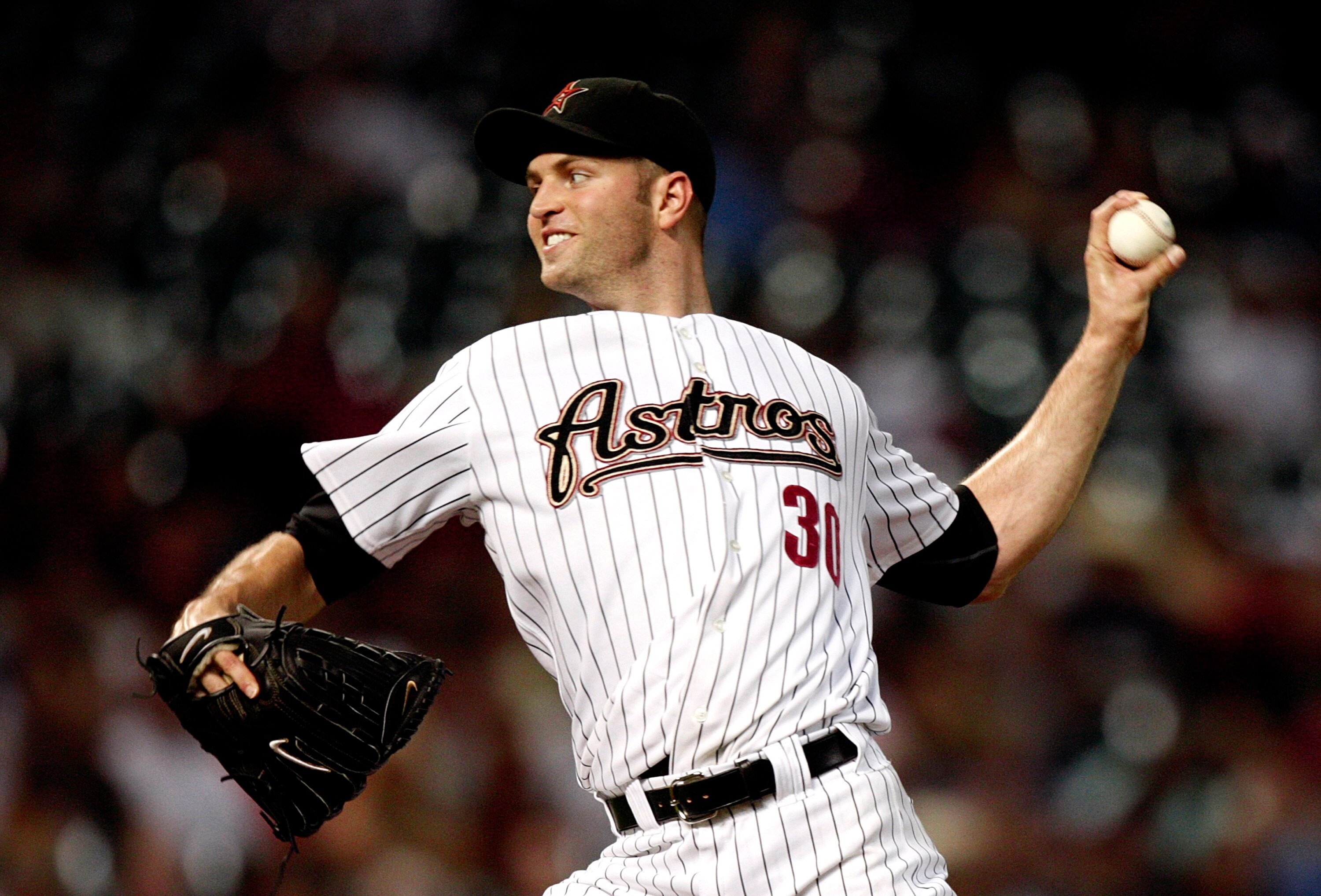 HOUSTON - AUGUST 30:  Pitcher J.A. Happ #30 of the Houston Astros throws against the St. Louis Cardinals at Minute Maid Park on August 30, 2010 in Houston, Texas.  (Photo by Bob Levey/Getty Images)