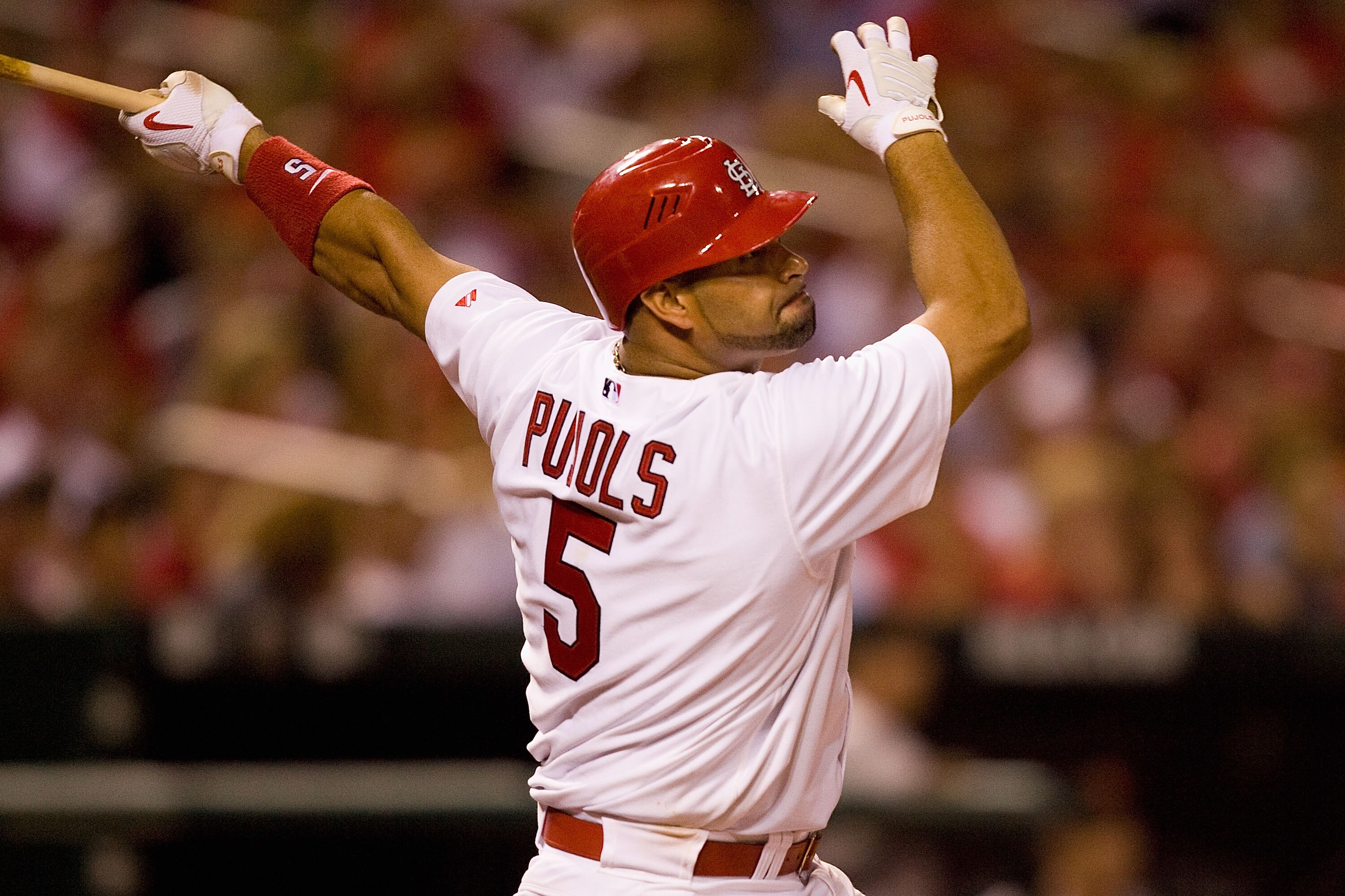 ST. LOUIS - AUGUST 21: Albert Pujols #5 of the St. Louis Cardinals bats against the San Francisco Giants at Busch Stadium on August 21, 2010 in St. Louis, Missouri.  (Photo by Dilip Vishwanat/Getty Images)