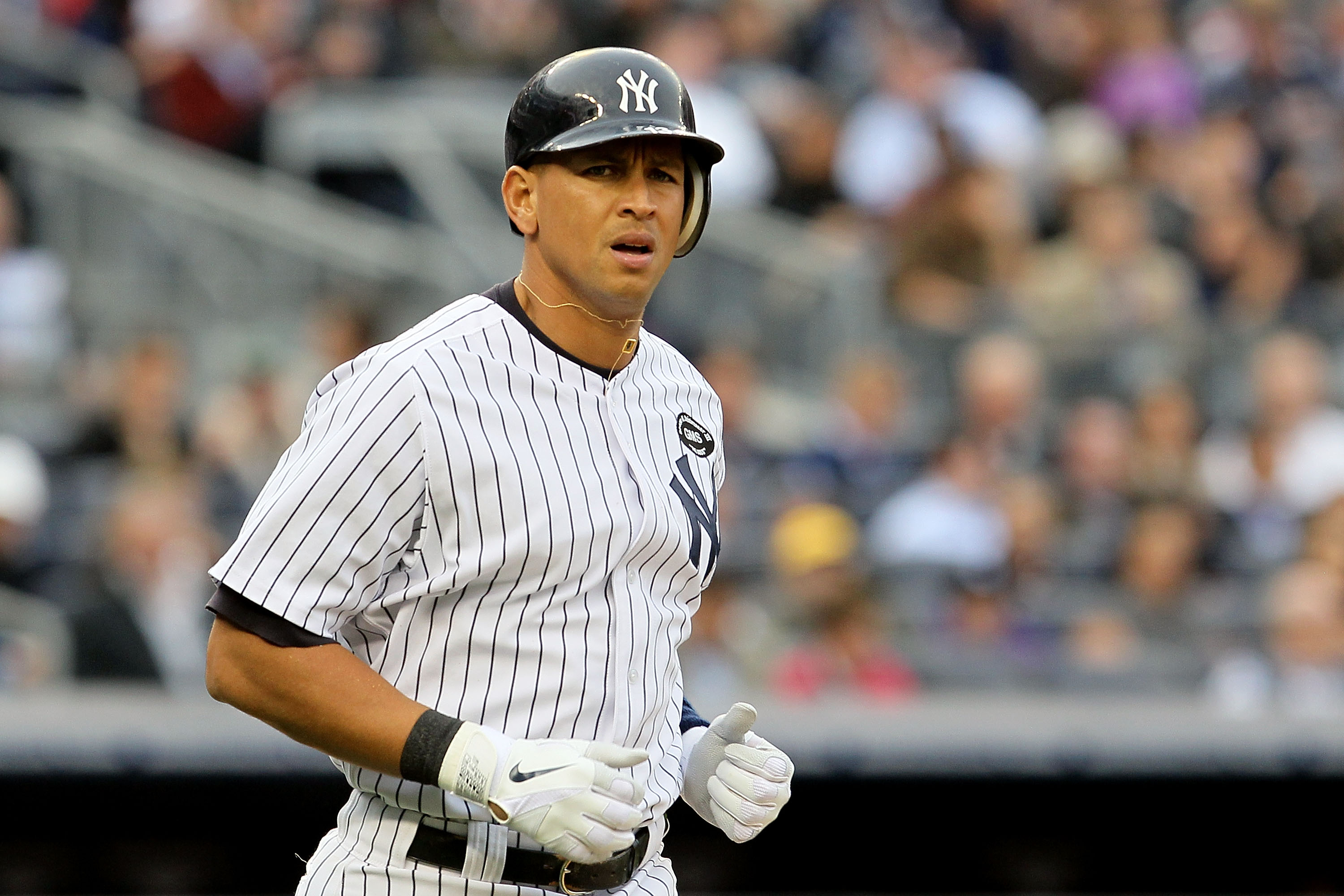 NEW YORK - OCTOBER 20:  Alex Rodriguez #13 of the New York Yankees takes a walk in the bottom of the second against the Texas Rangers in Game Five of the ALCS during the 2010 MLB Playoffs at Yankee Stadium on October 20, 2010 in the Bronx borough of New Y