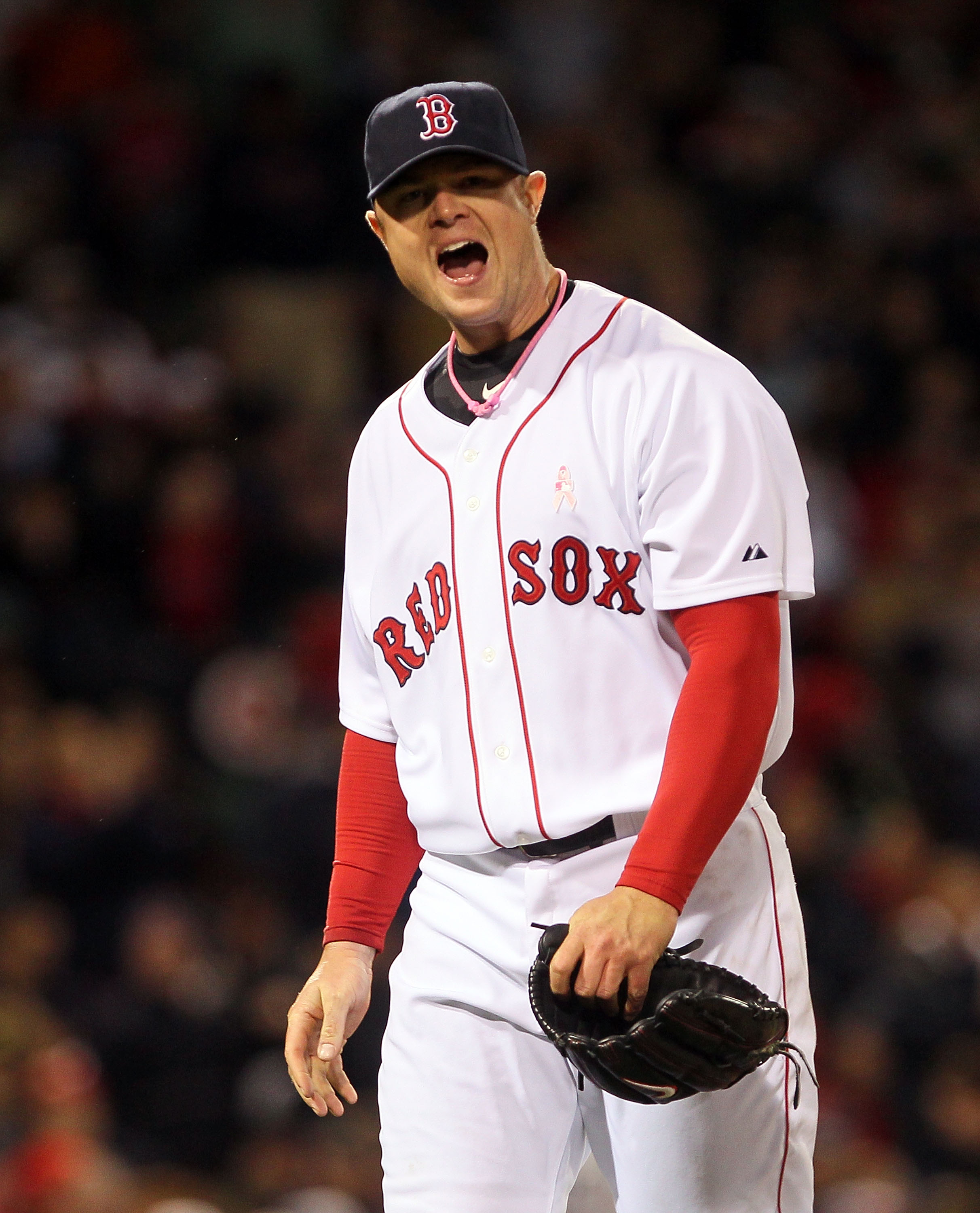 BOSTON - MAY 9:  Jon Lester #31 of the Boston Red Sox reacts in the fourth inning against the New York Yankees at Fenway Park on May 9, 2010 in Boston, Massachusetts. (Photo by Jim Rogash/Getty Images)
