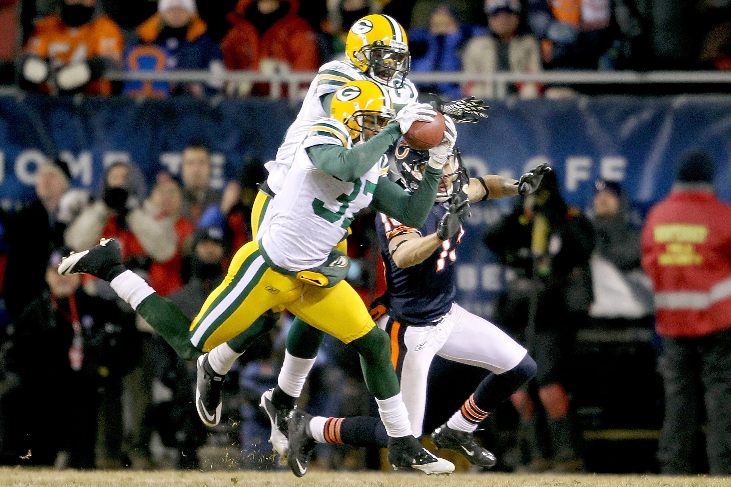 CHICAGO, IL - JANUARY 23:  Sam Shields #37 of the Green Bay Packers intercepts the game's final pass to seal the 21-14 victory for the Packers against the Chicago Bears in the NFC Championship Game at Soldier Field on January 23, 2011 in Chicago, Illinois
