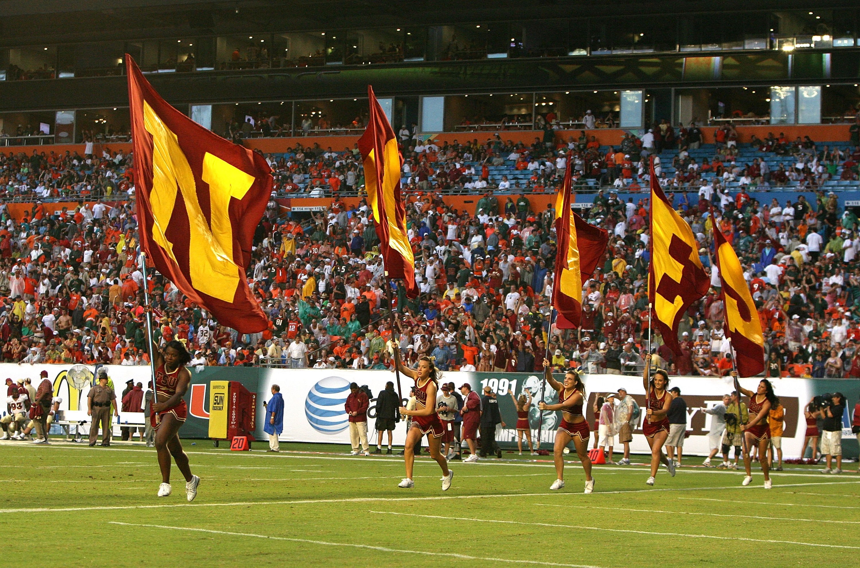 MIAMI - OCTOBER 04:  Seminole cheerleaders celebrate after a touchdown by the Florida State Seminoles against the Miami Hurricanes at Dolphin Stadium on October 4, 2008 in Miami, Florida. Florida State defeated Miami 41-39.  (Photo by Doug Benc/Getty Imag