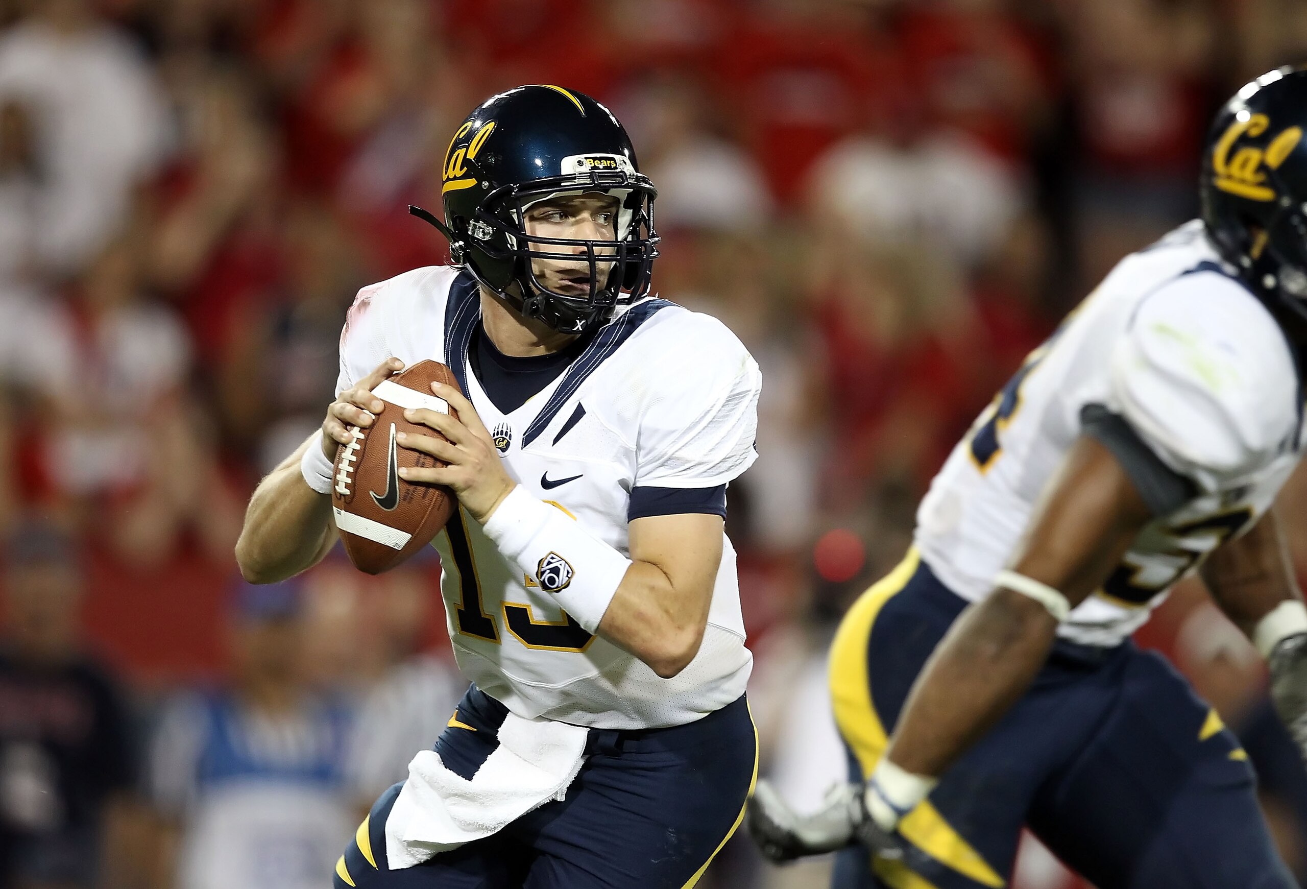 TUCSON, AZ - SEPTEMBER 25:  Quarterback Kevin Riley #13 of the California Golden Bears drops back to pass during the college football game against the Arizona Wildcats at Arizona Stadium on September 25, 2010 in Tucson, Arizona. The Wildcats defeated the
