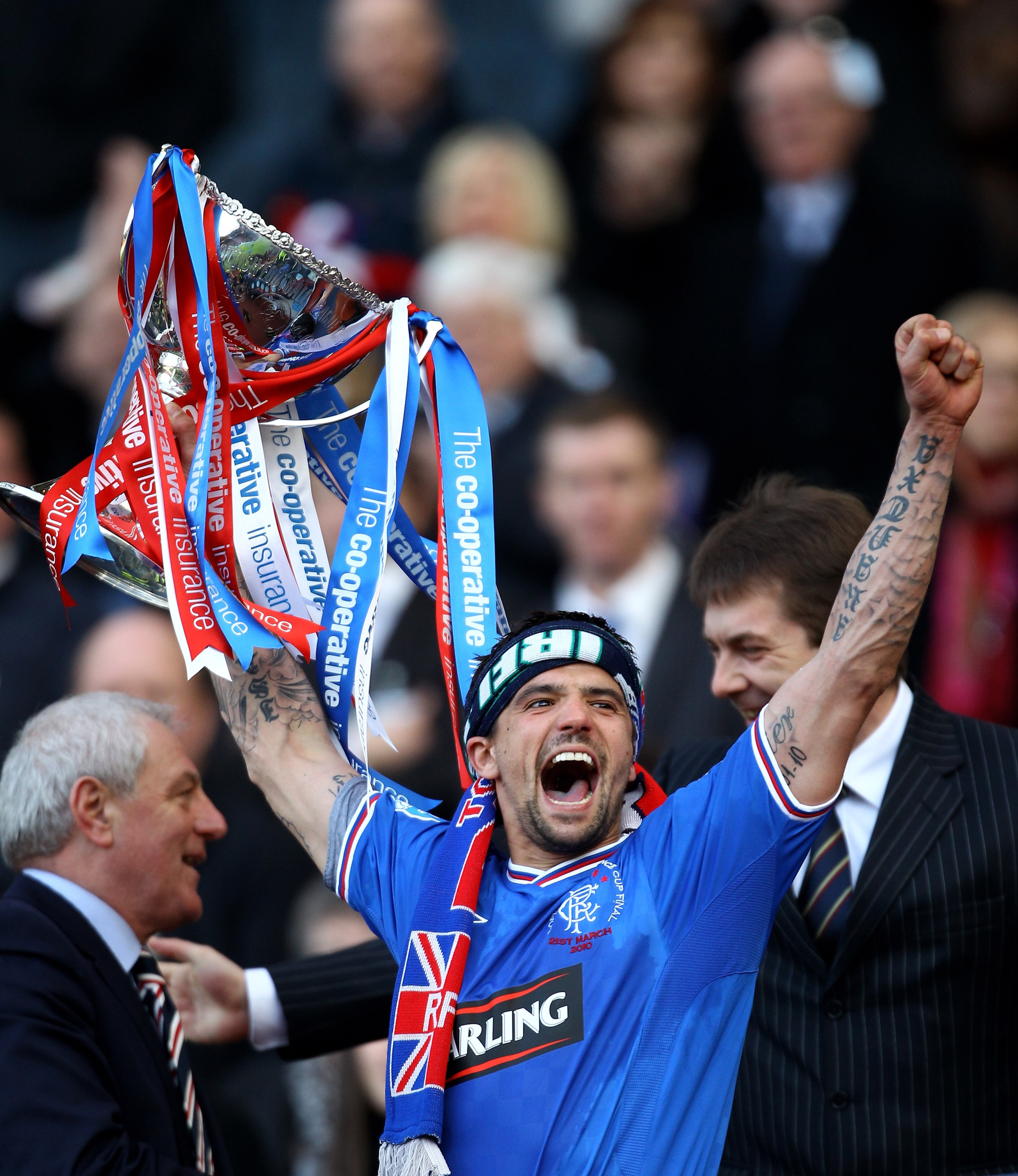 GLASGOW, SCOTLAND - MARCH 21:  Nacho Novo of Rangers lifts the CIS Insurance Cup after beating St Mirren 1-0 in the final at Hampden Park on March 21, 2010 in Glasgow, Scotland.  (Photo by Jeff J Mitchell/Getty Images)